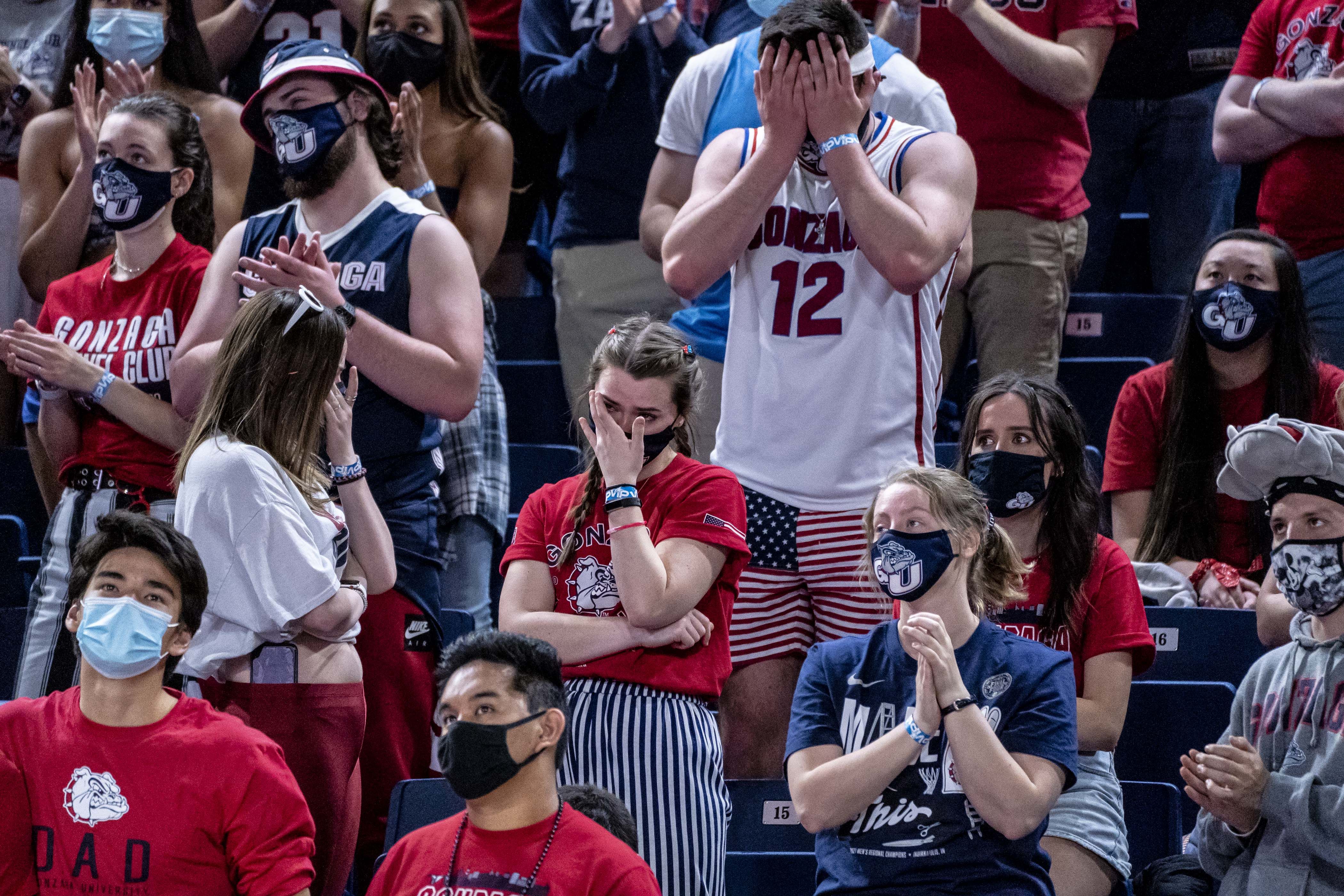Gonzaga University students react during a watch party at the McCarthey Athletic Center at Gonzaga University on April 5, 2021 in Spokane, Washington. 