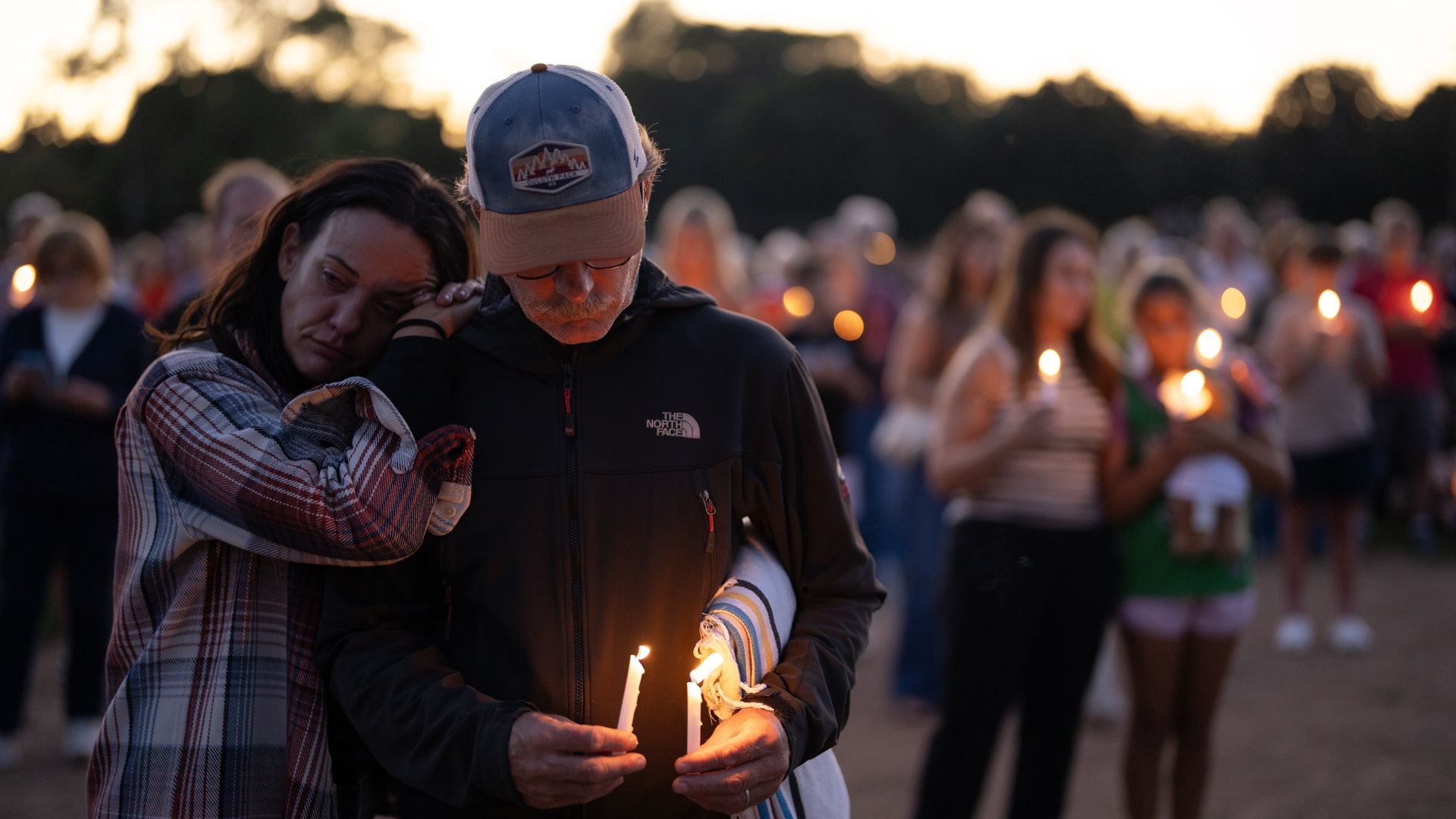  Community members gathered at Lynnhurst Park in Minneapolis for a candlelight vigil to honor the victims and survivors of the shooting at Annunciation Catholic School in Minneapolis Wednesday, August 27, 2025. Protect Minnesota and Moms Demand Action organized the vigil. 