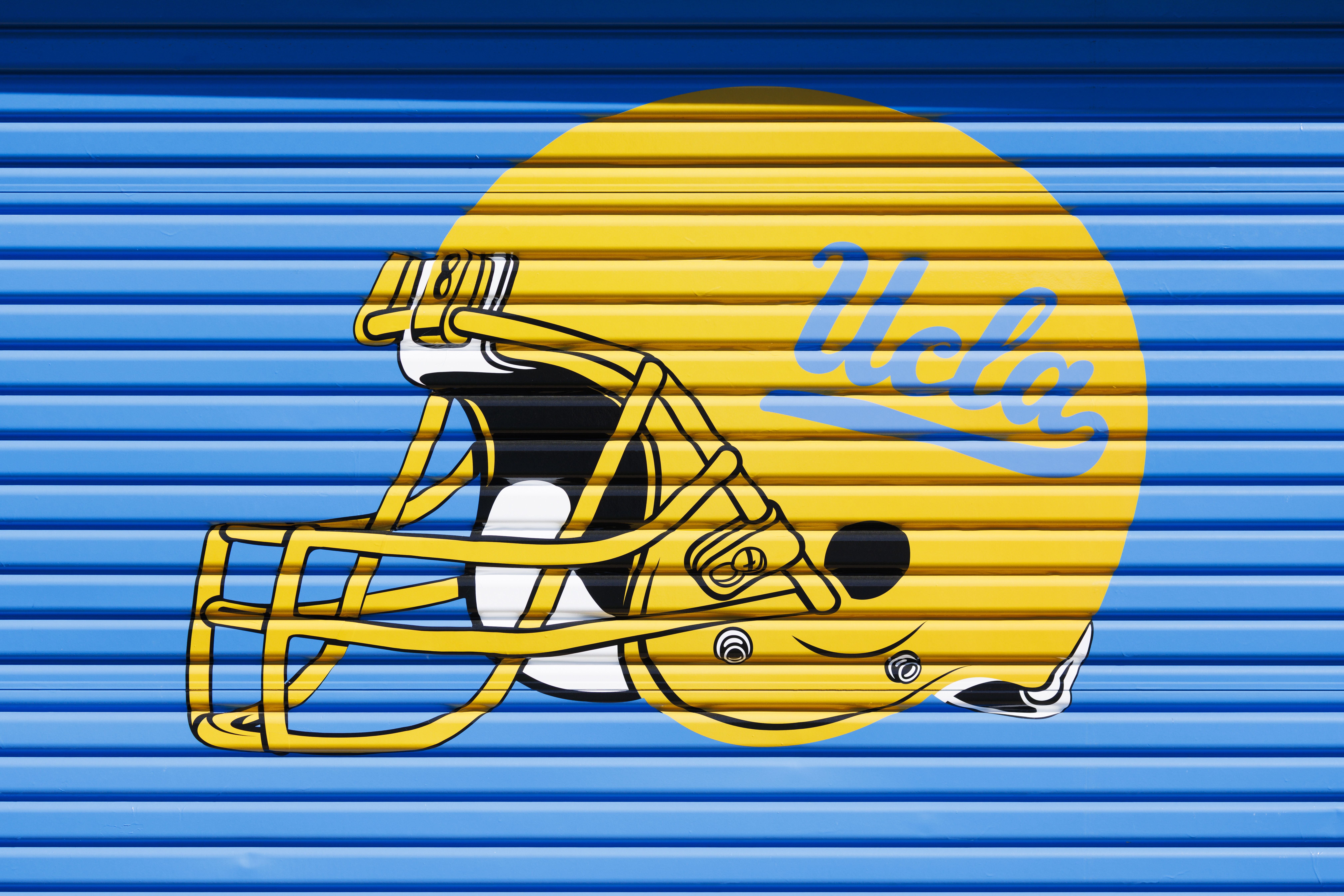 ucla helmet painted on a wall