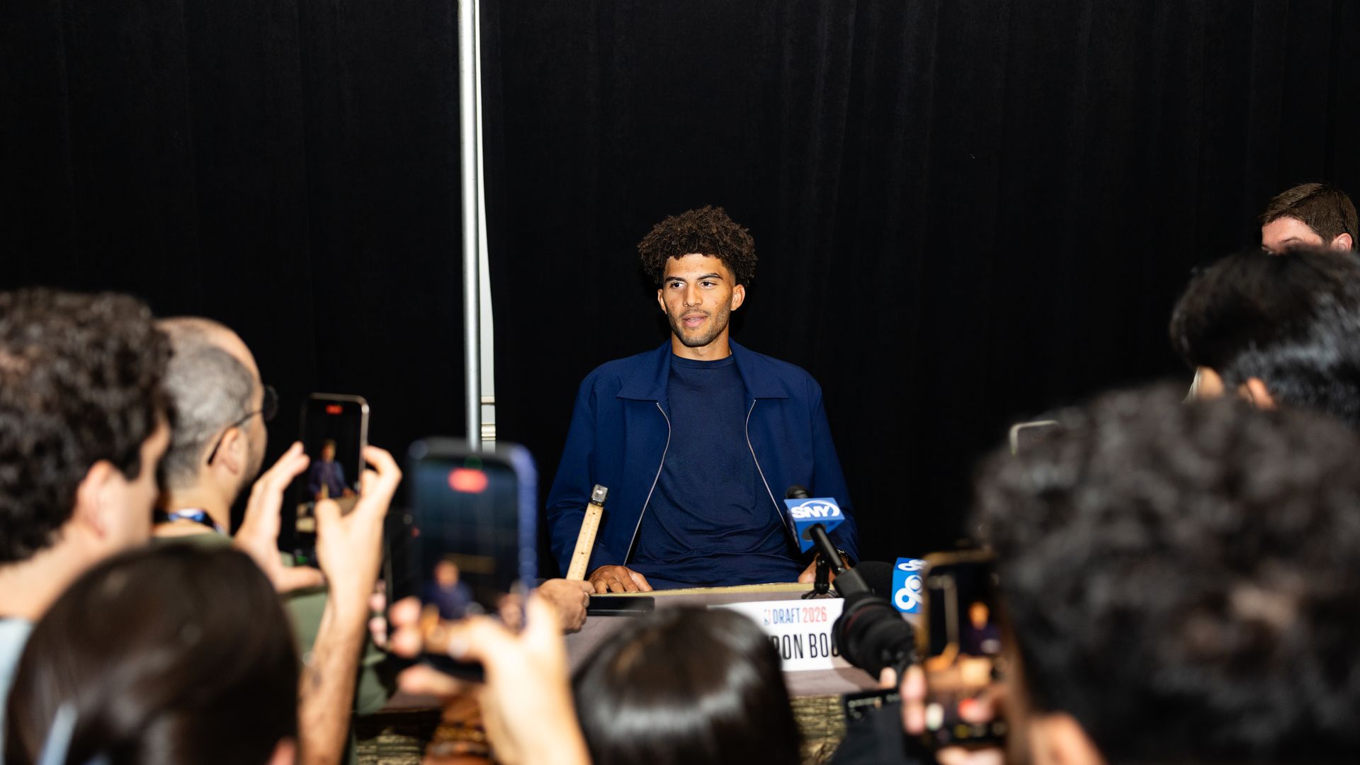 NEW YORK, NY - JUNE 22: NBA Draft prospect Cameron Boozer talks to the media during the 2026 NBA Draft Player Availability on June 22, 2026 at Lotte New York Palace in New York City, New York. NOTE TO USER: User expressly acknowledges and agrees that, by downloading and or using this photograph, Use