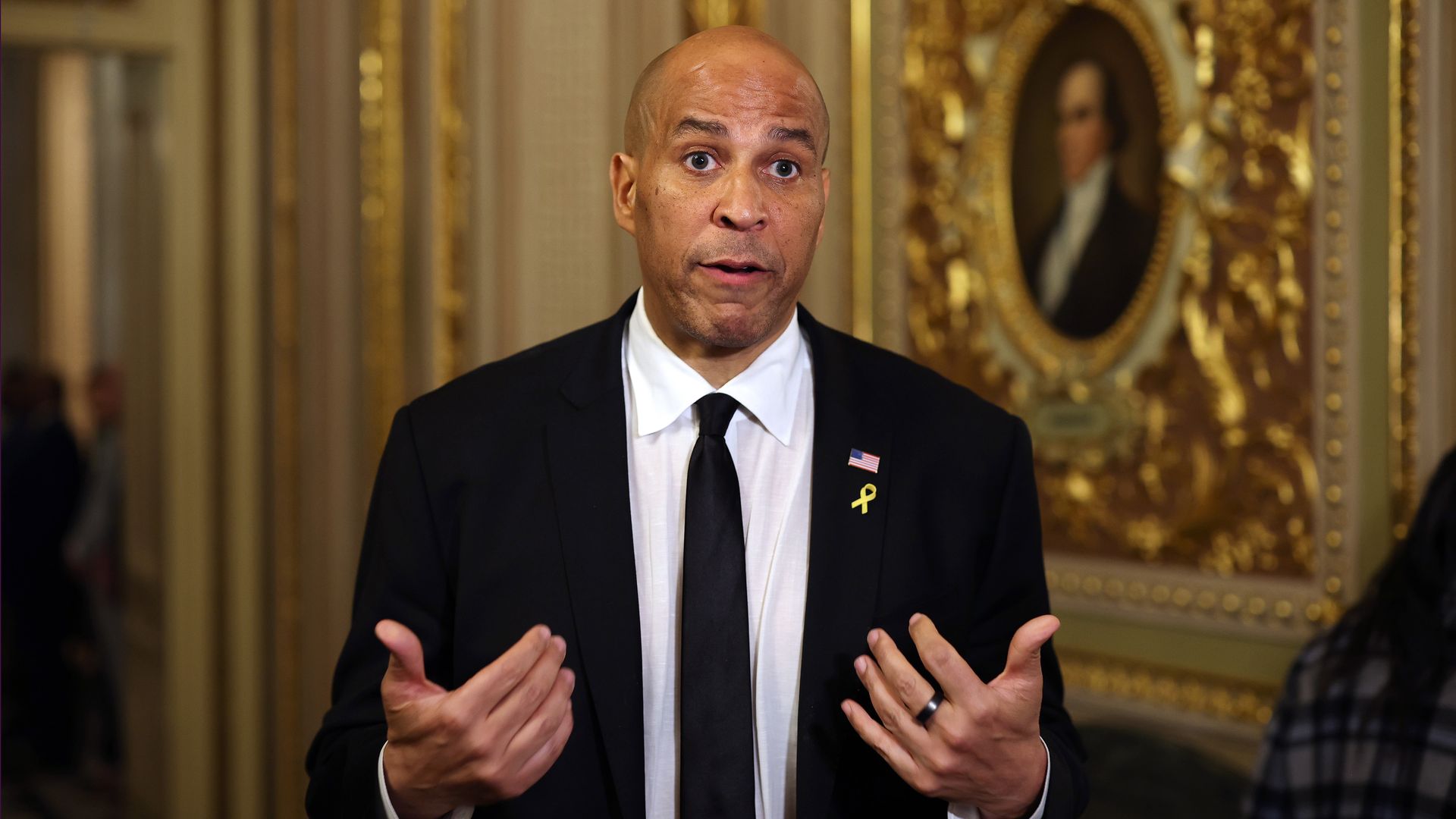 Sen. Cory Booker (D-NJ) speaks to reporters as he leaves the Senate Chamber after delivering a record setting floor speech at the U.S. Capitol on April 01, 2025 in Washington, DC.