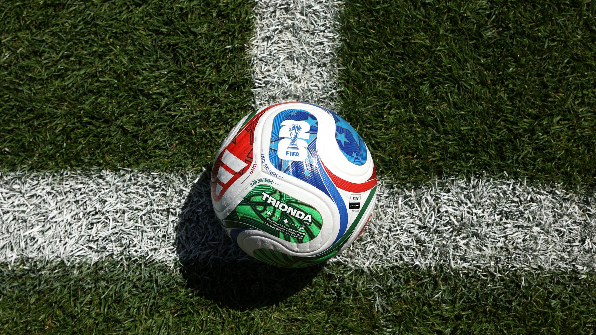 Photo of the FIFA soccer ball on the pitch.