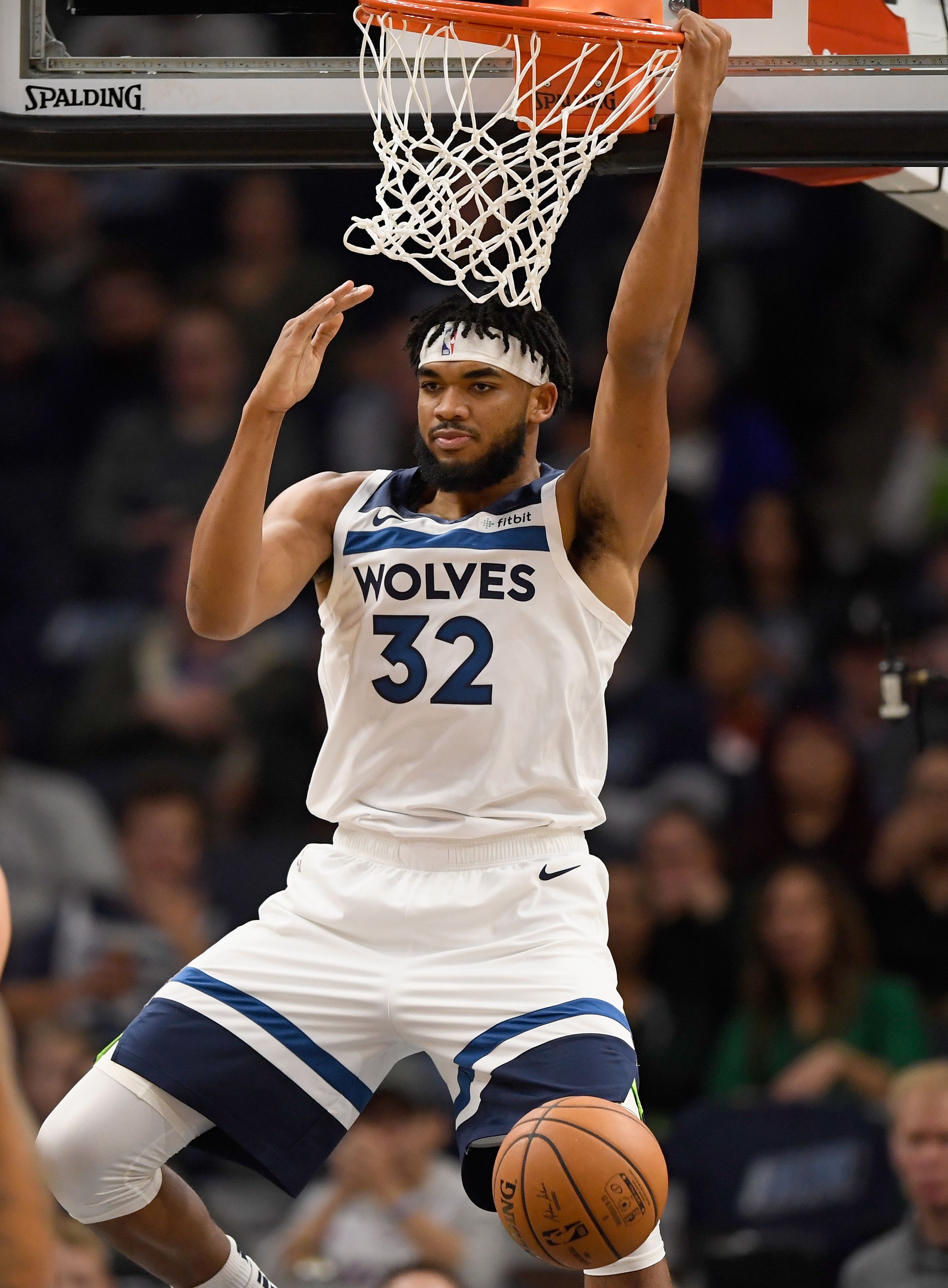 Karl-Anthony Towns hanging on the rim