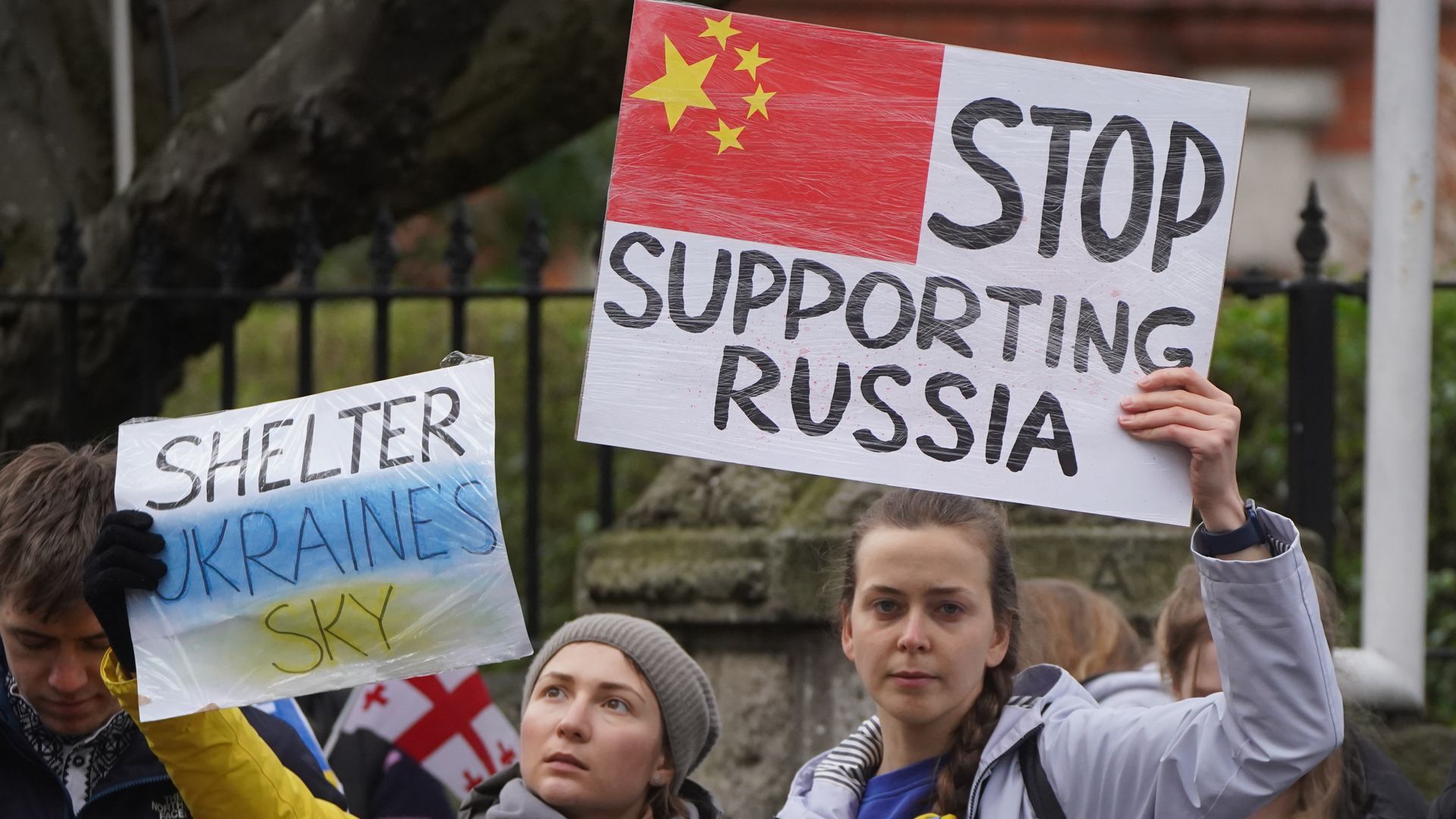 People protesting outside the Chinese Embassy in Dublin over the Russian invasion of Ukraine.