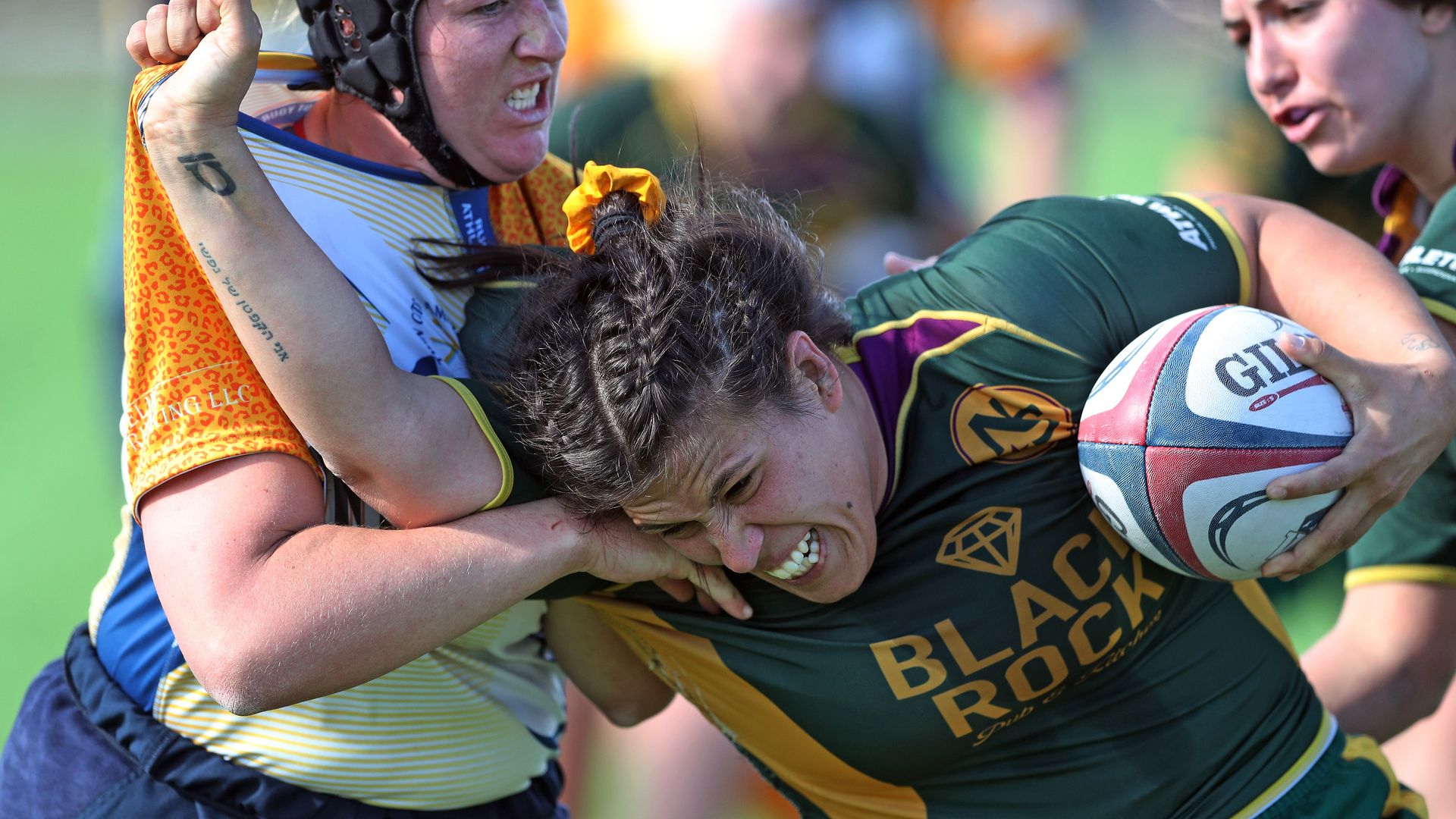 woman playing rugby