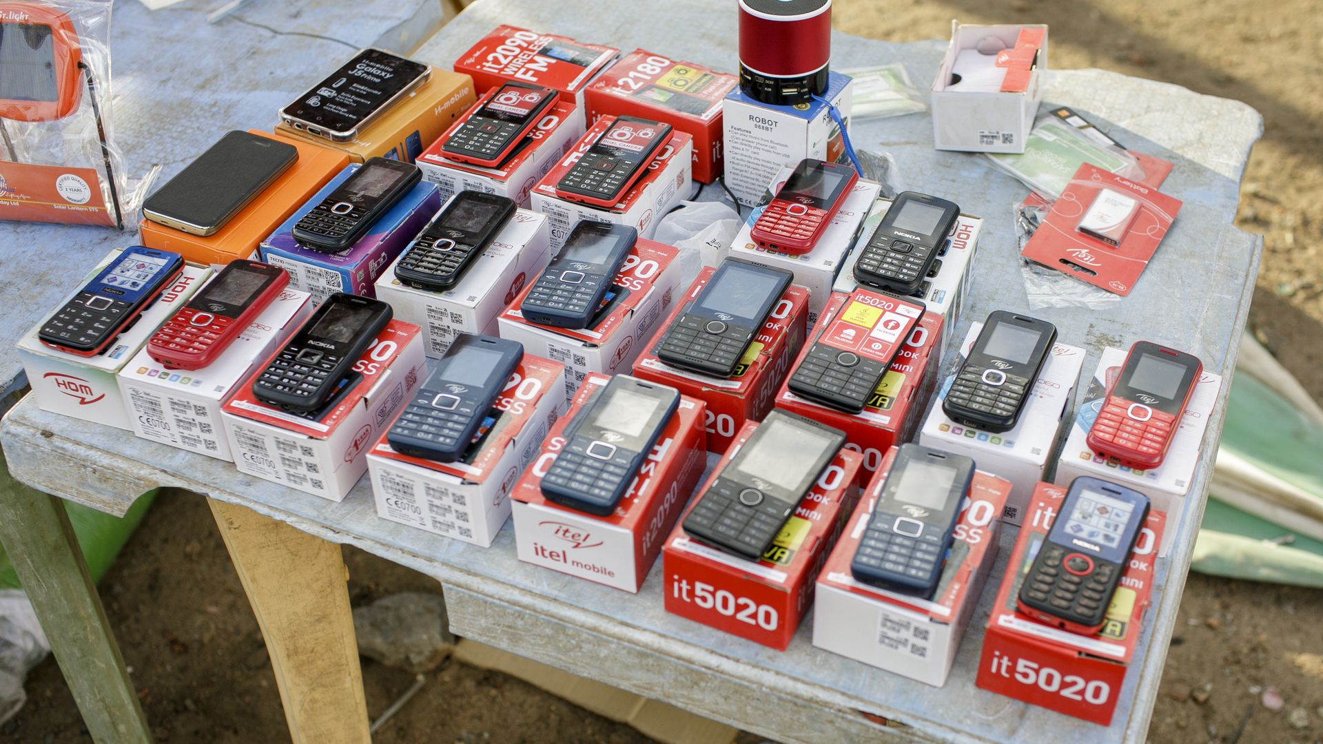 Cell phones placed on a table, street trade in Talek on May 17, 2017 in Talek, Kenya. 