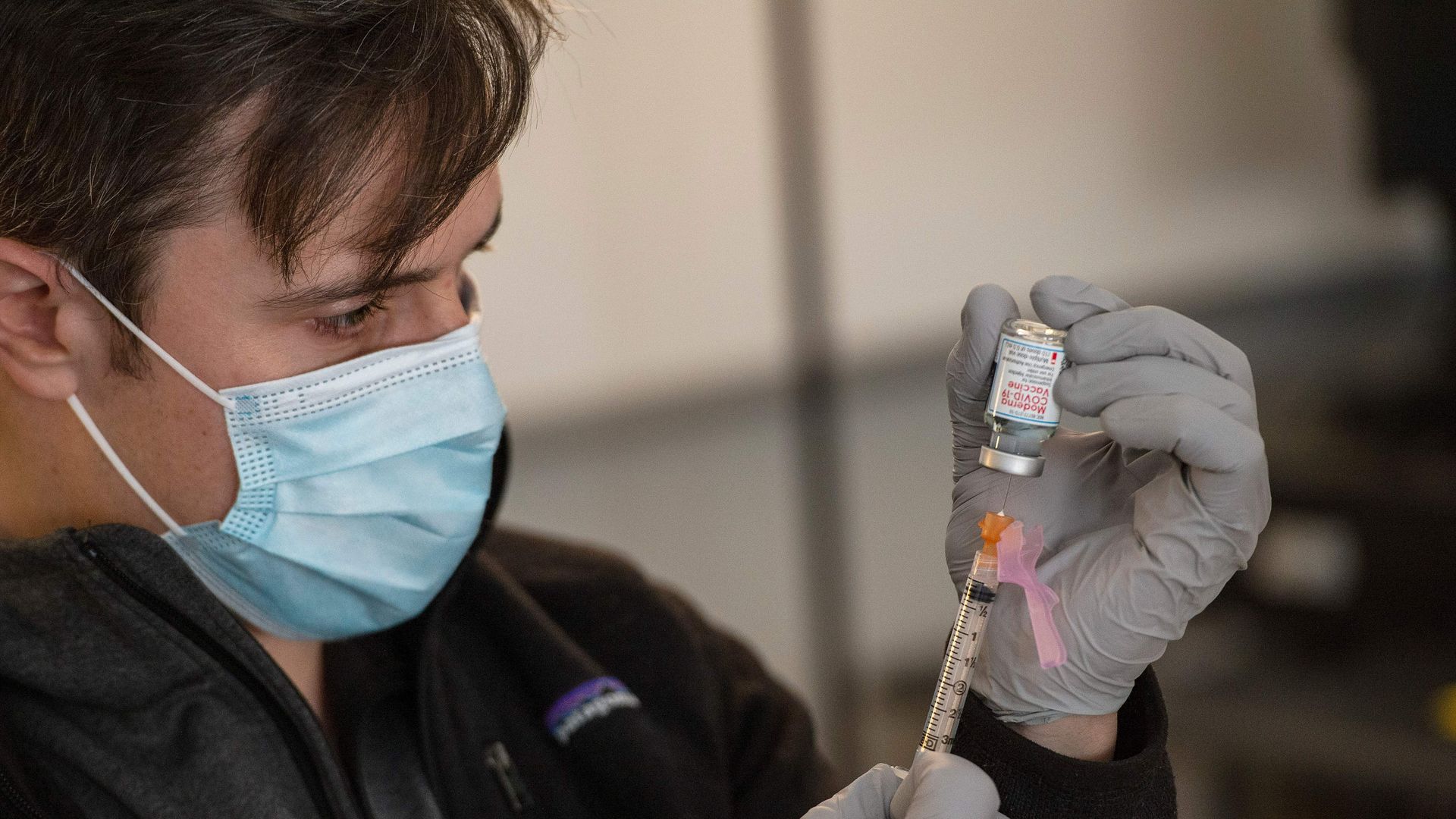 A doctor drawing the Moderna vaccine into syringes in Central Falls, Rhode Island, on Feb. 13.
