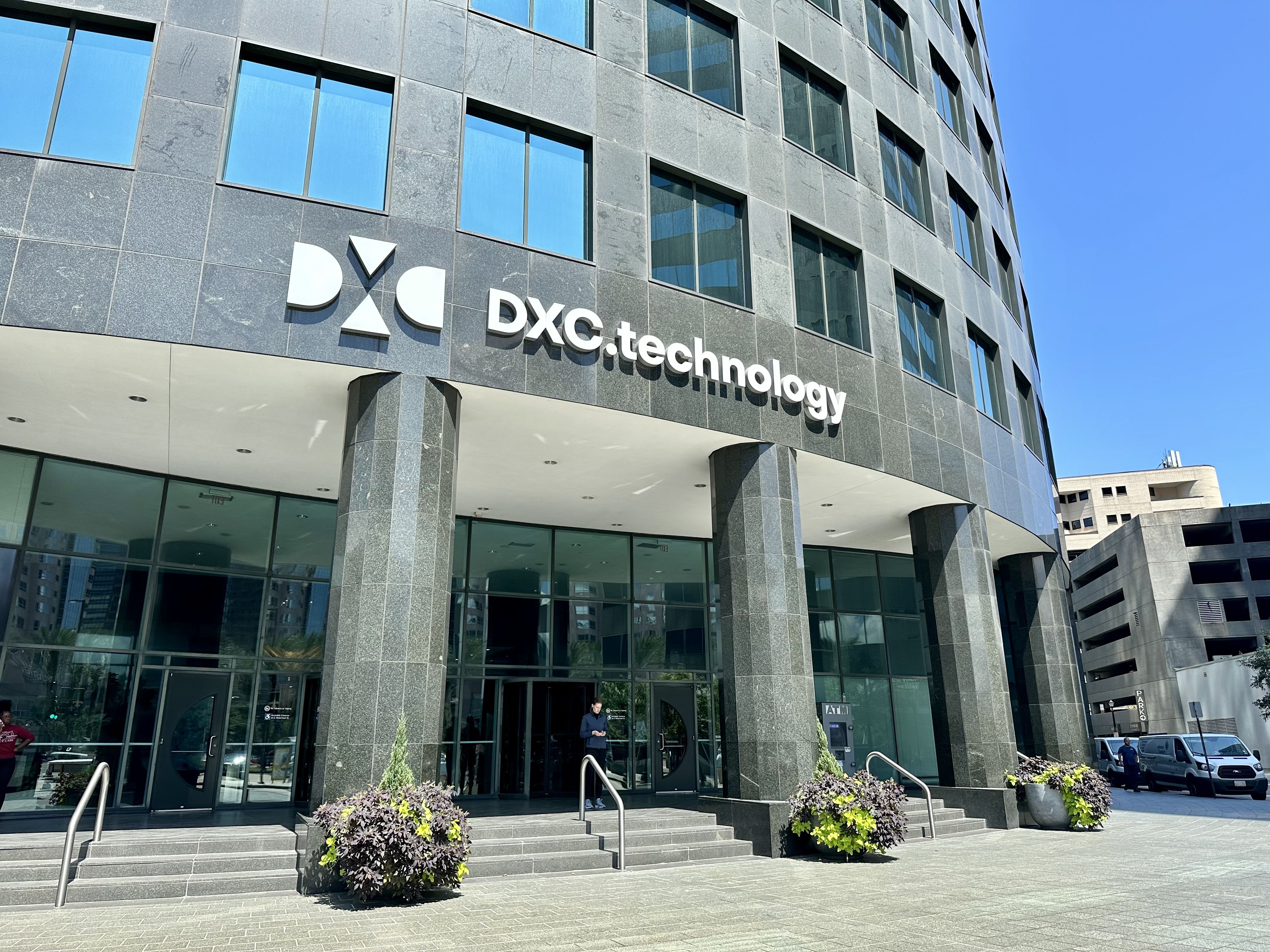 Photo shows the exterior of DXC Technology office tower.
