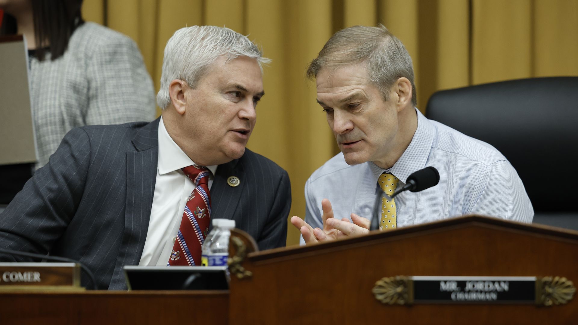 Rep. James Comer (R-KY) (L) talks to Chairman Rep. Jim Jordan (R-OH) as former Special Counsel Robert K. Hur testifies before the House Judiciary Committee on March 12, 2024 in Washington, DC.