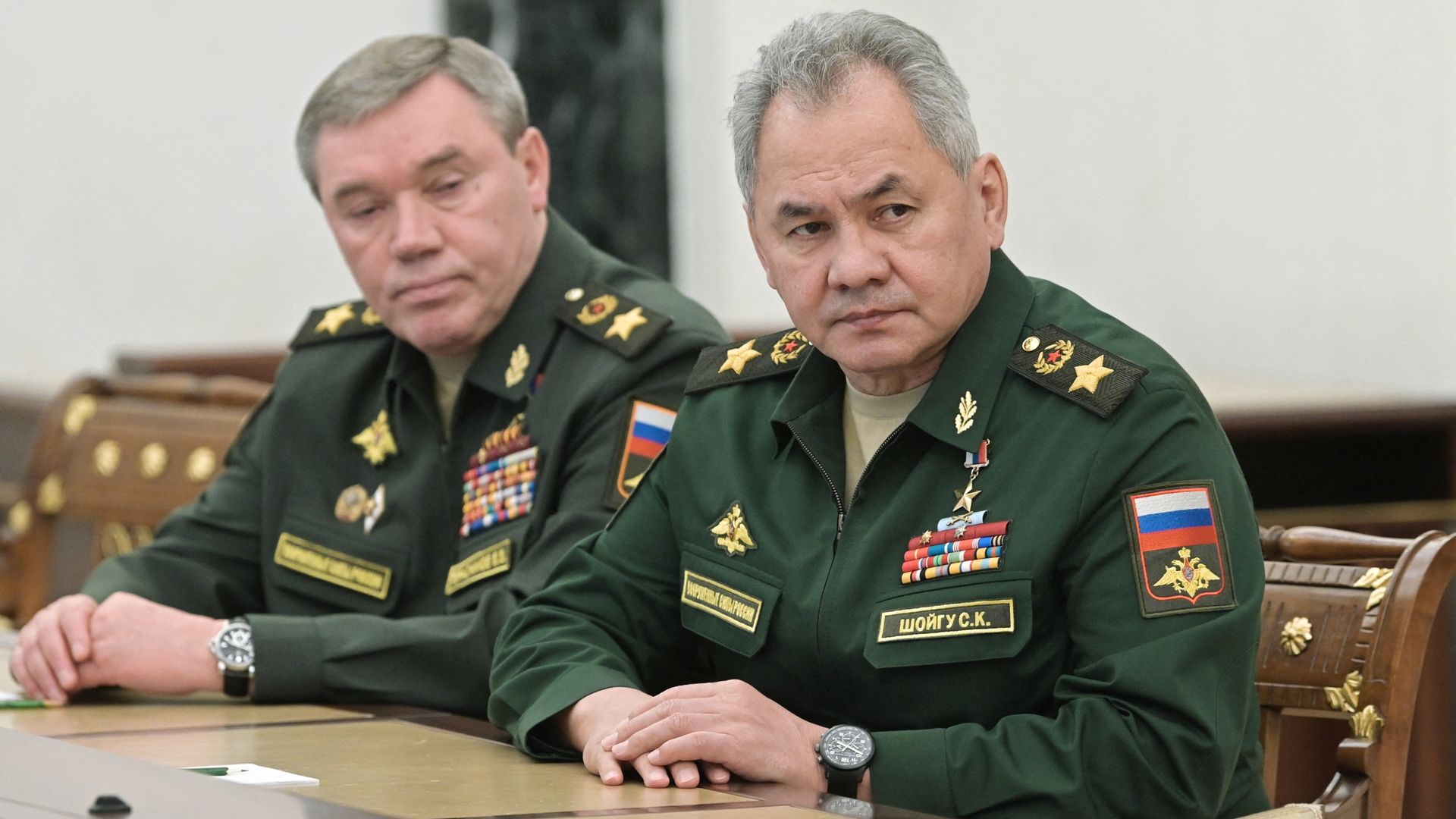 Russian Defense Minister Sergei Shoigu (R) with chief of the general staff Valery Gerasimov during a meeting with President Vladimir Putin in Moscow in February 2022.