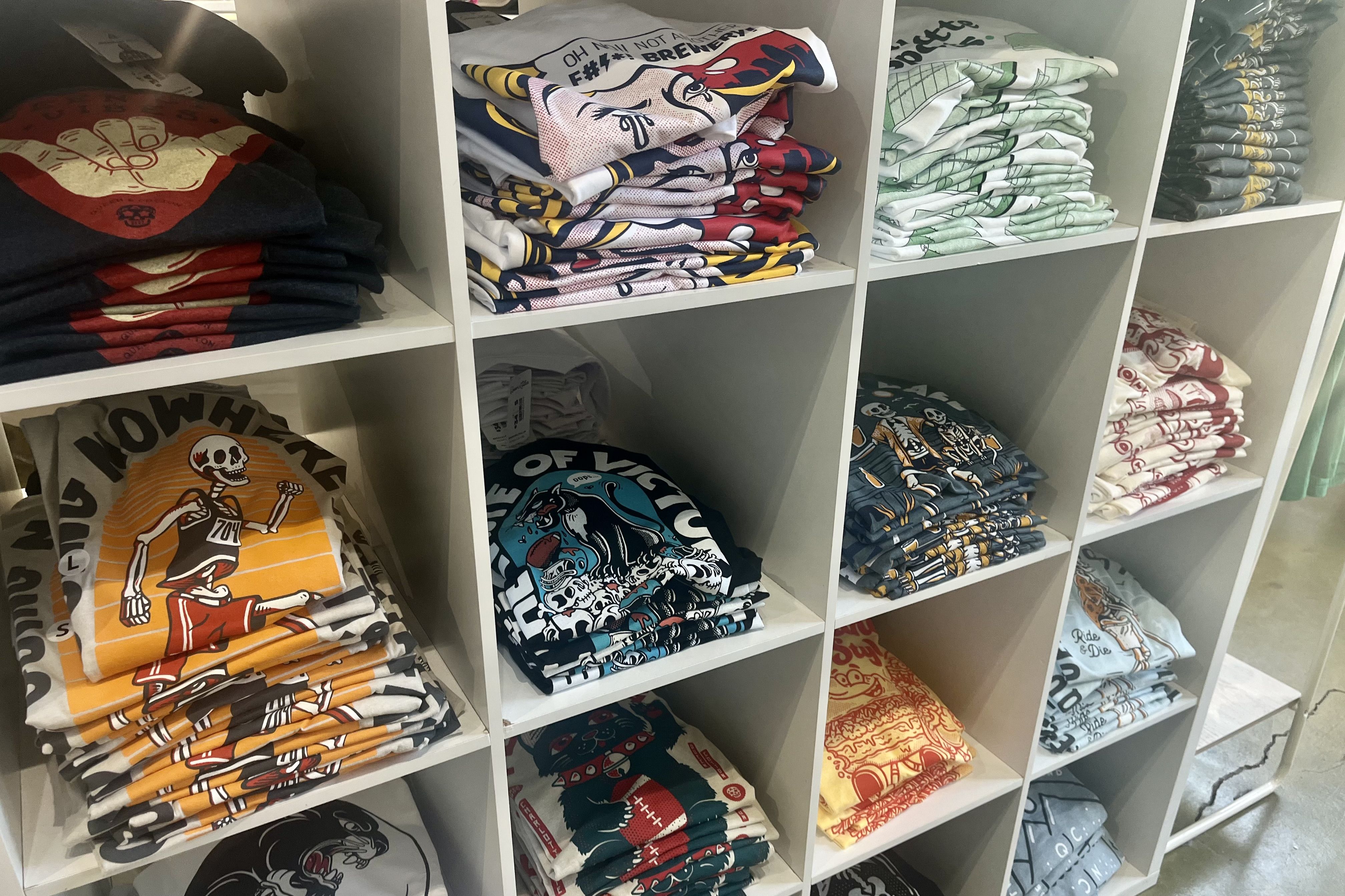 t-shirts on shelves