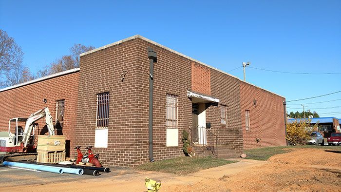 devine-barrel-front-of-building