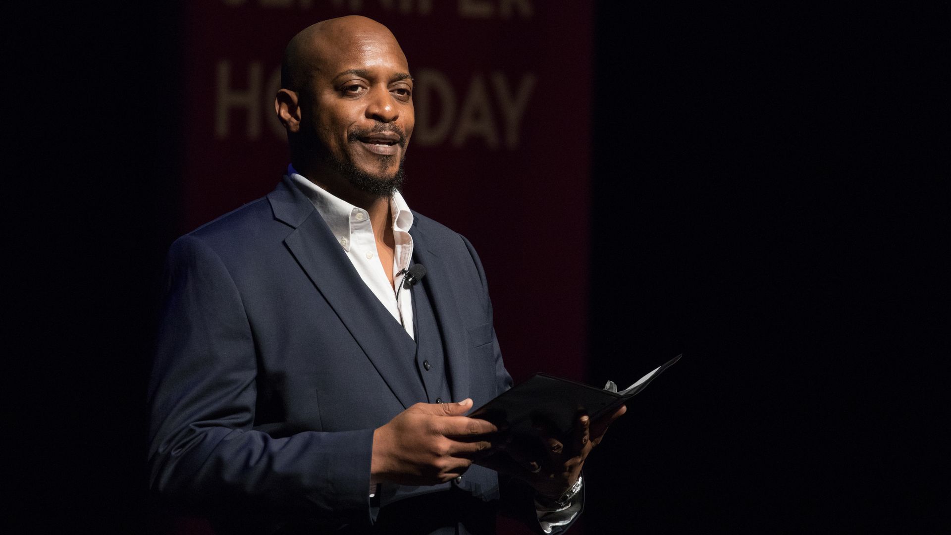 Marc Pouhé speaks onstage at the 2019 Texas Medal Of Arts Awards presentation.