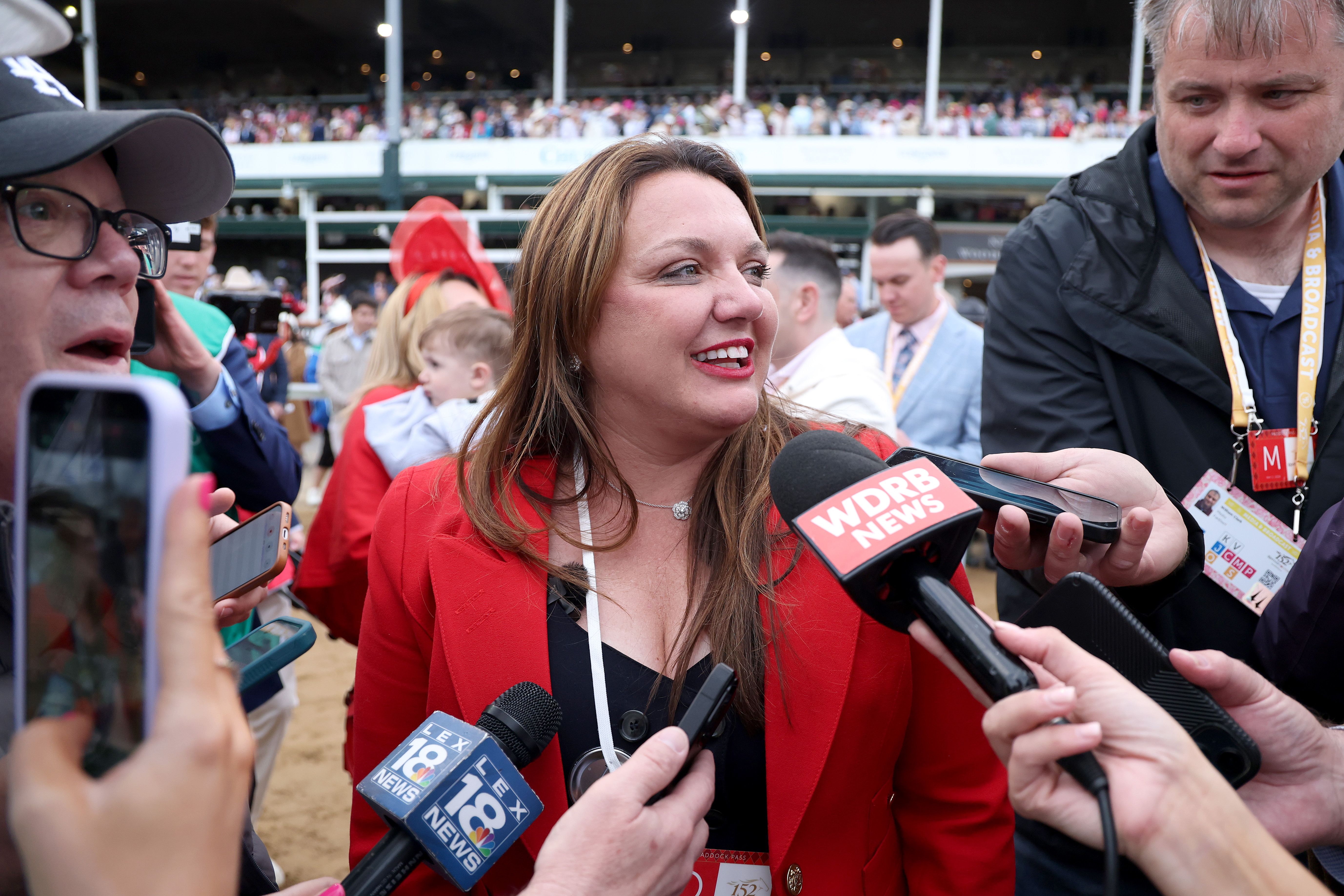 Trainer Cherie DeVaux celebrates at Churchill Downs after Golden Tempo wins the 2026 Kentucky Derby.