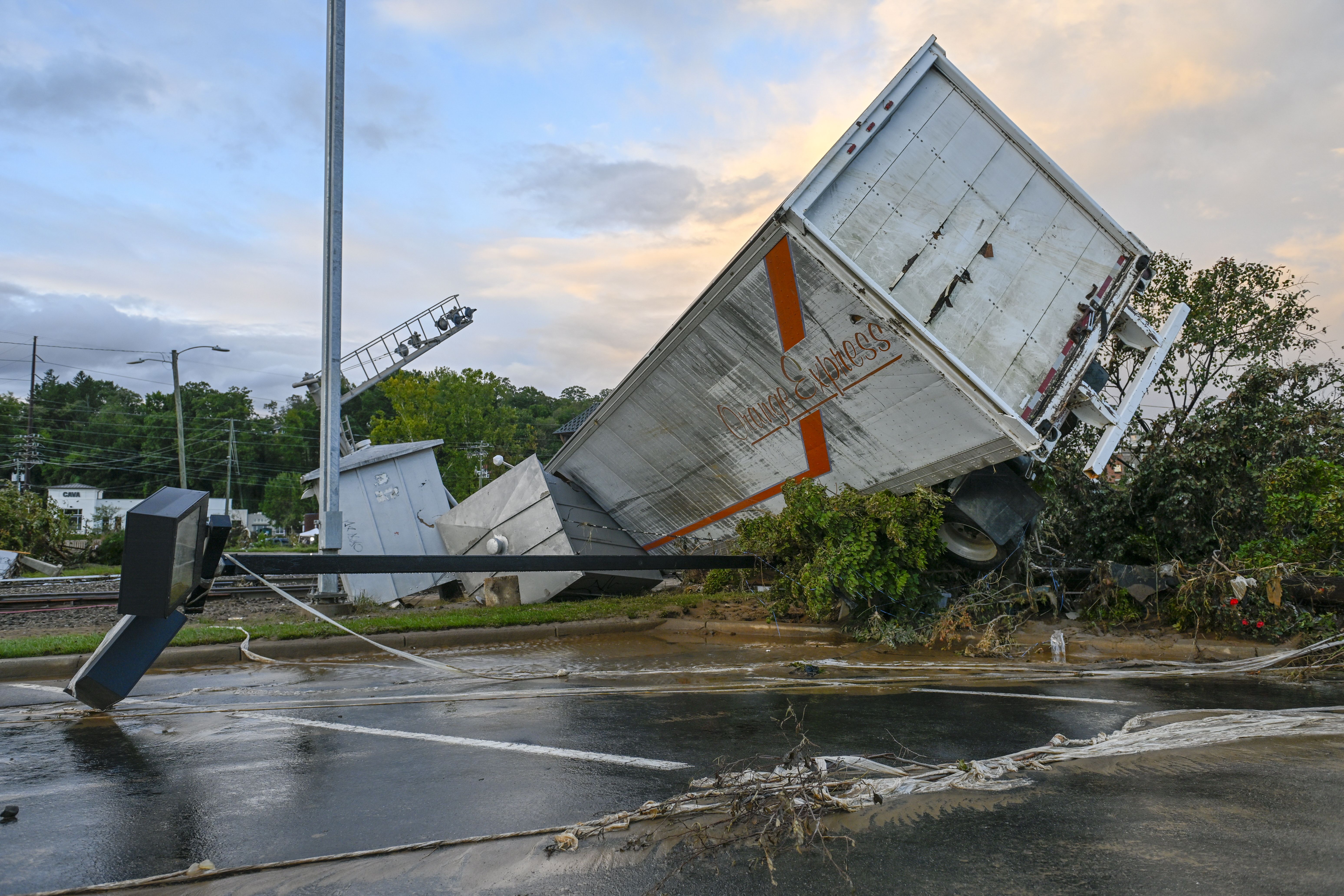 a container from a tractor-trailer after Tropical Storm Helene in western North Carolina