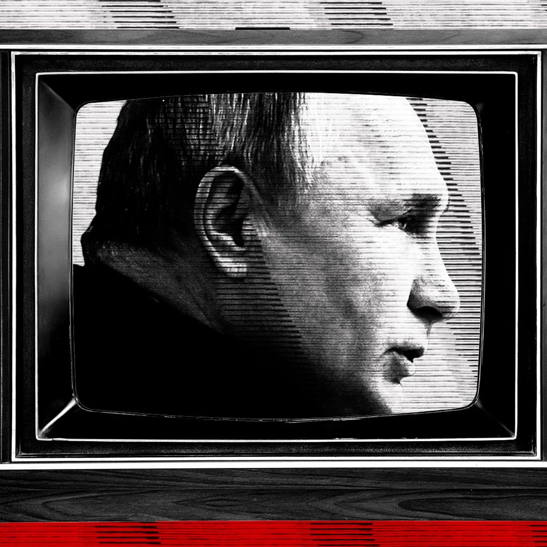 Photo illustration of President Vladimir Putin with a television set and the Russian flag