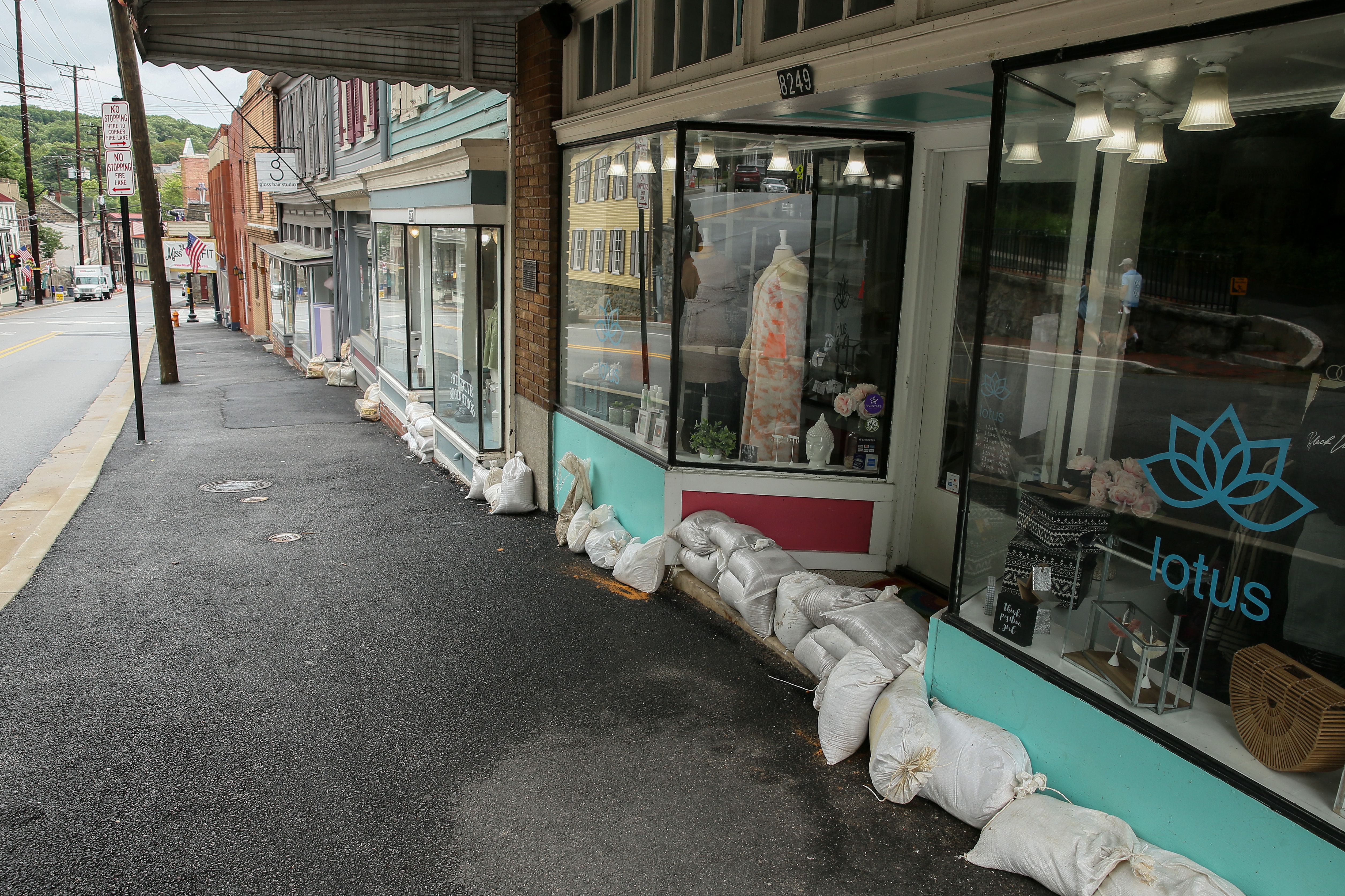 Sandbags are seen in front of local businesses along main Main Street after Tropical Storm Isaias moved through the region on August 04, 2020 in Ellicott City, Maryland. 