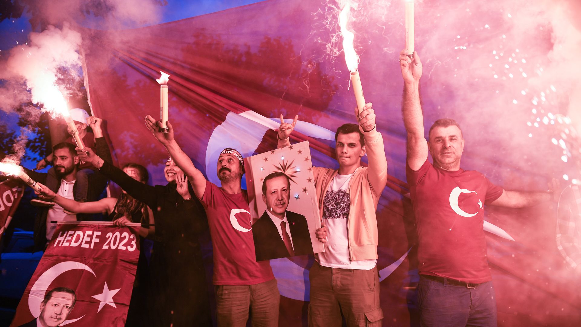 Erdogan's supporters celebrate outside the AK party headquarters on June 24, 2018 in Istanbul, Turkey.