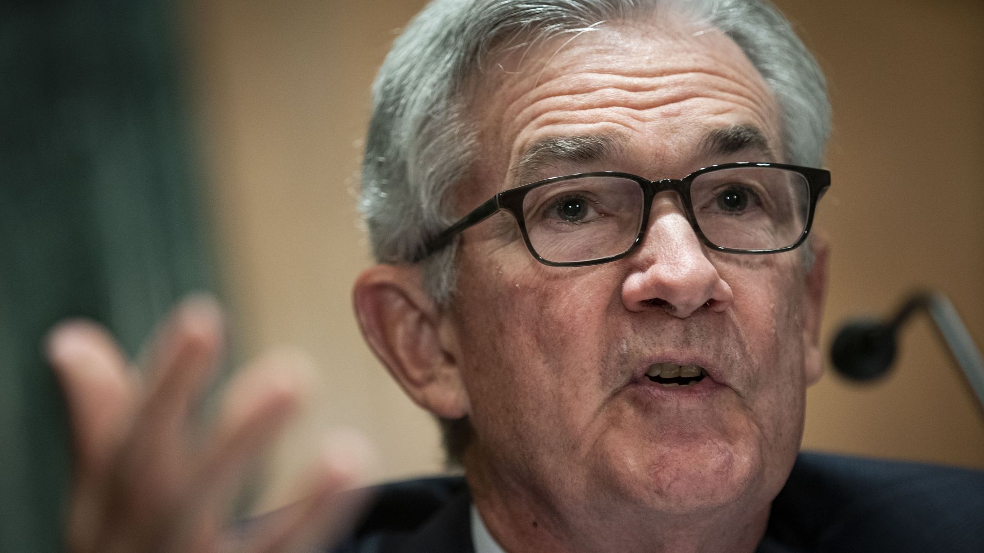 Federal Reserve Chairman Jerome Powell is seen testifying before Congress.