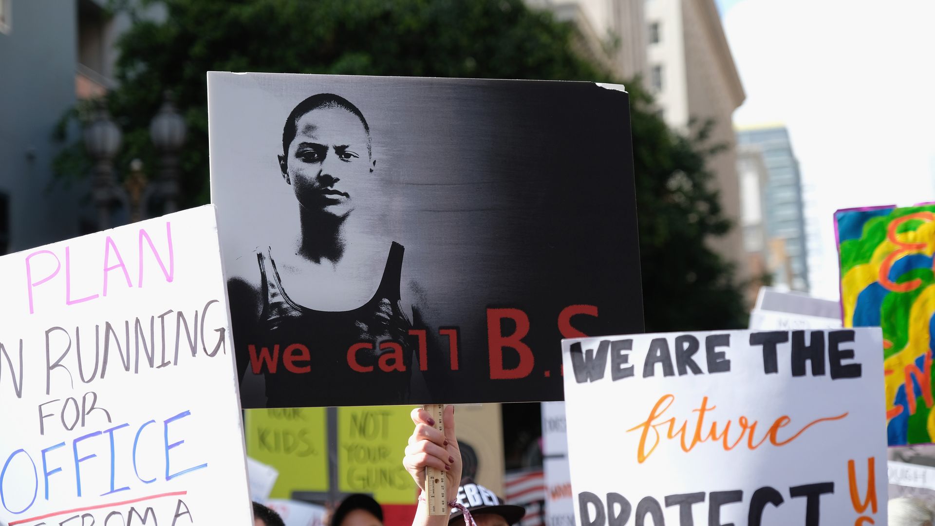 A black and white sign featuring Emma Gonzalez and the words "We call B.S."