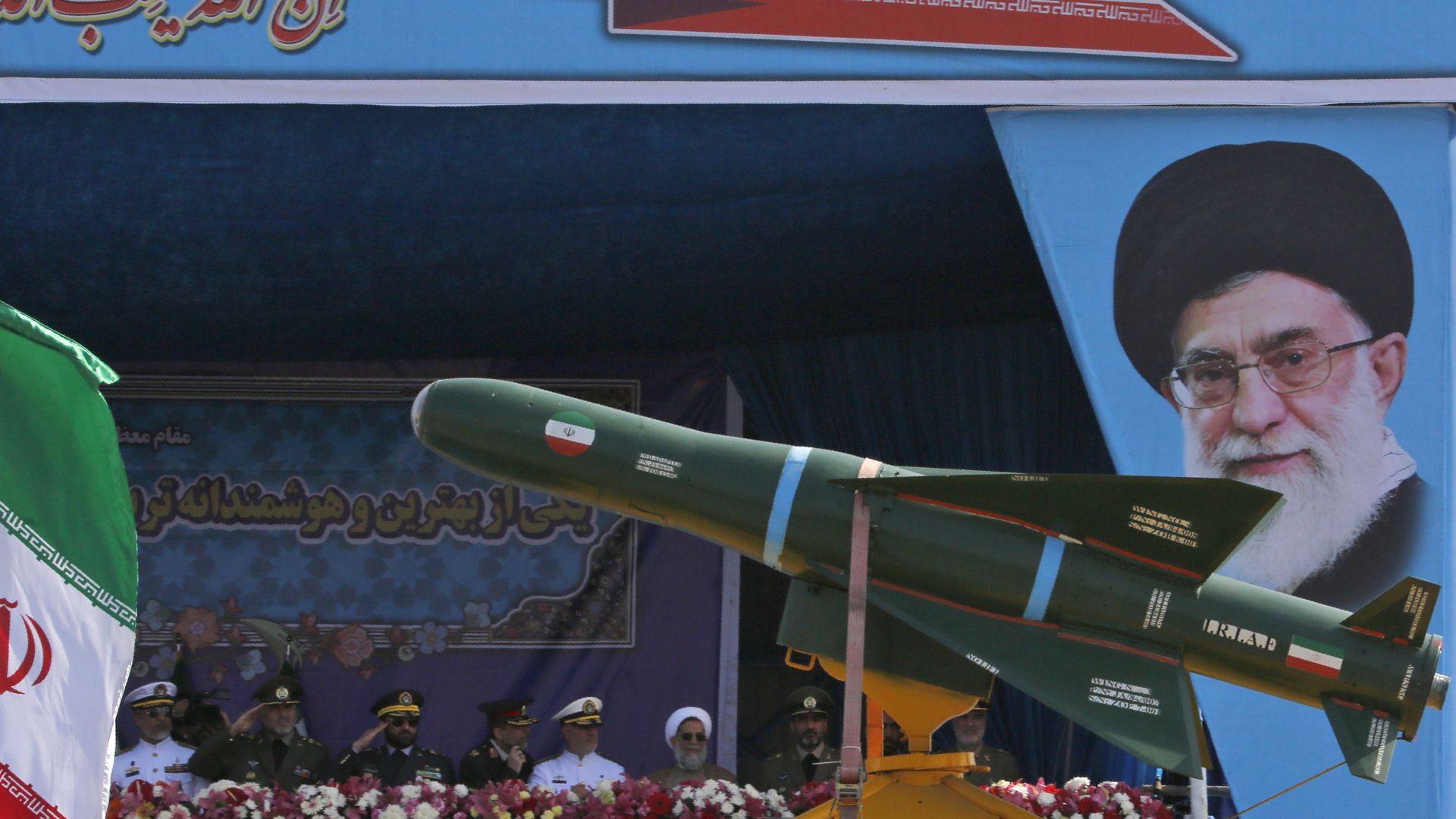 Military parade in Iran: missile driven past portrait of Ayatollah