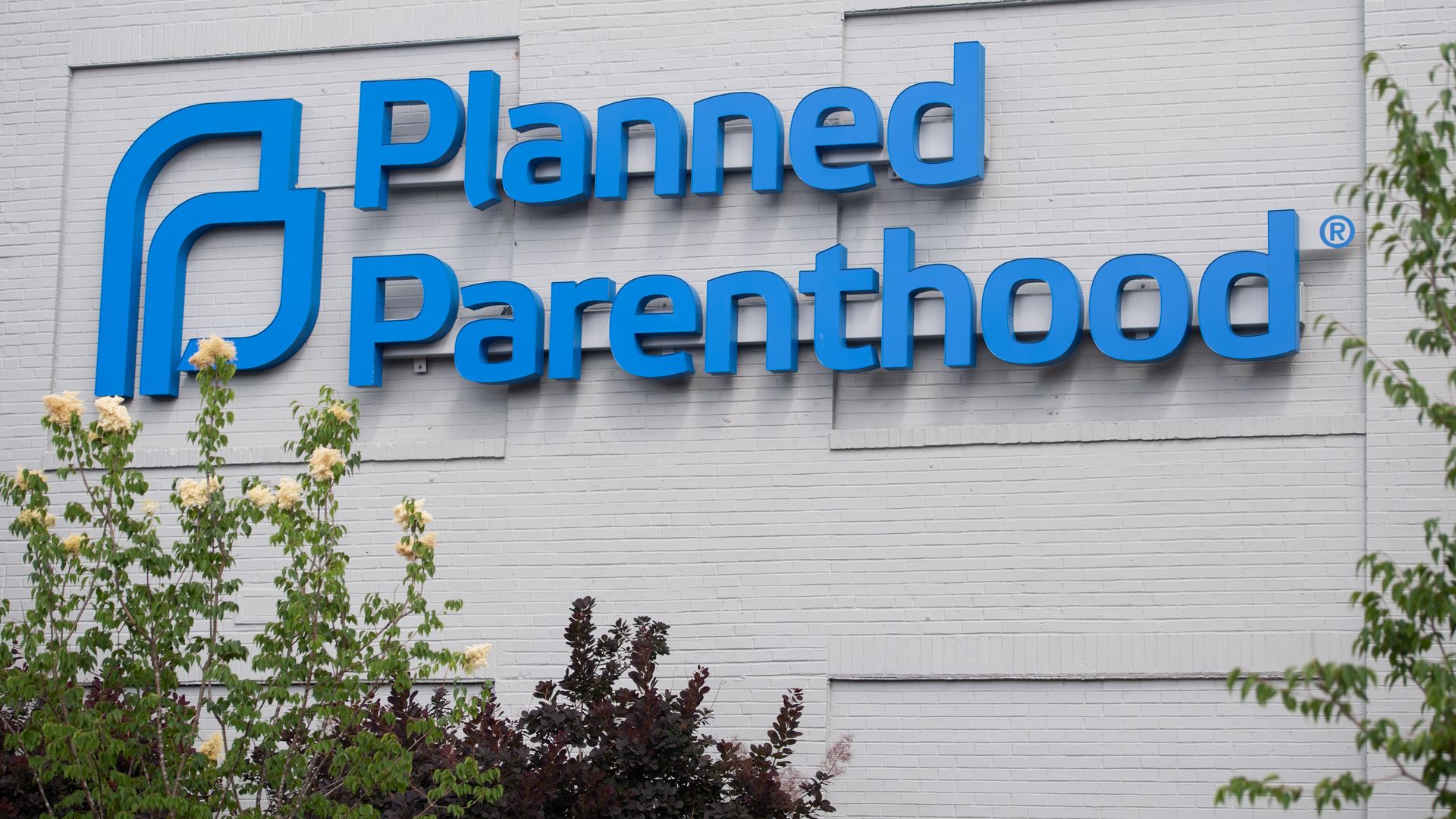 The logo of Planned Parenthood is seen outside the Planned Parenthood Reproductive Health Services Center in St. Louis, Missouri, May 30, 2019
