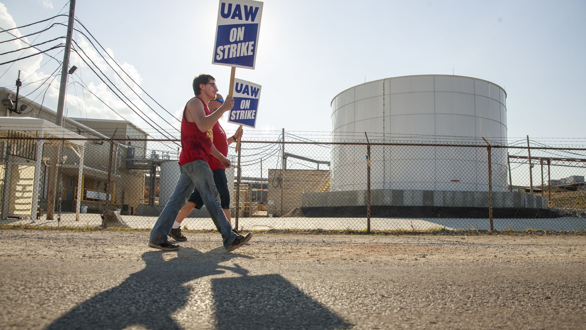 Workers from United Auto Workers picket during national labor strike against GM.