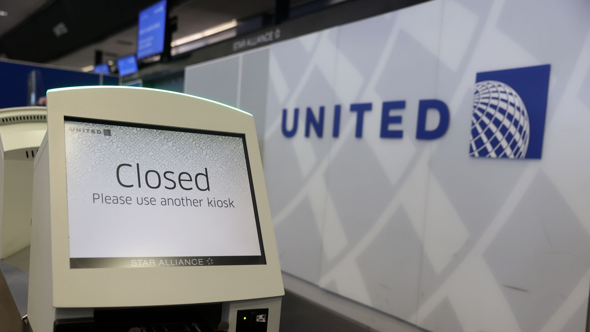 A closed united airlines kiosk