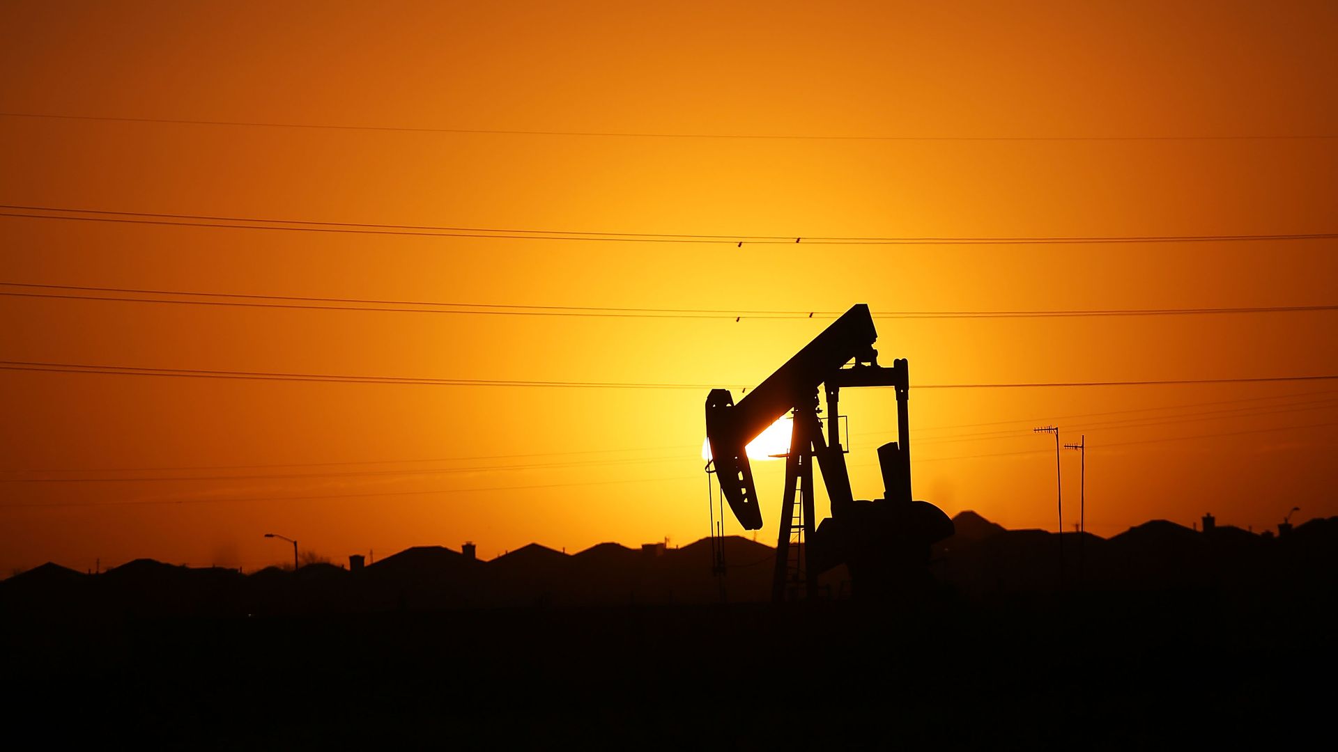 A oil pump in Texas at sunset