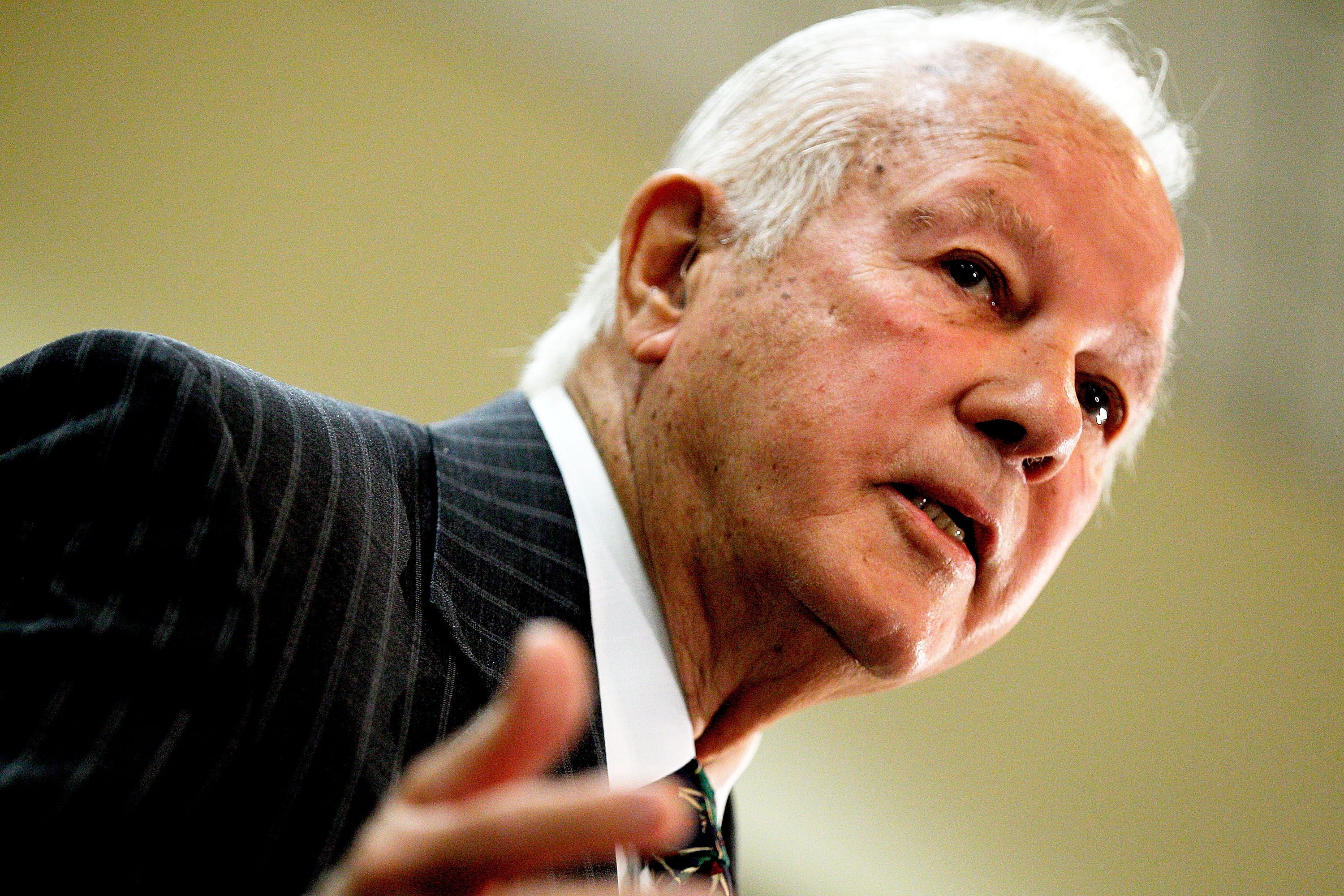 A close-up photo of Edwin Edwards' face.