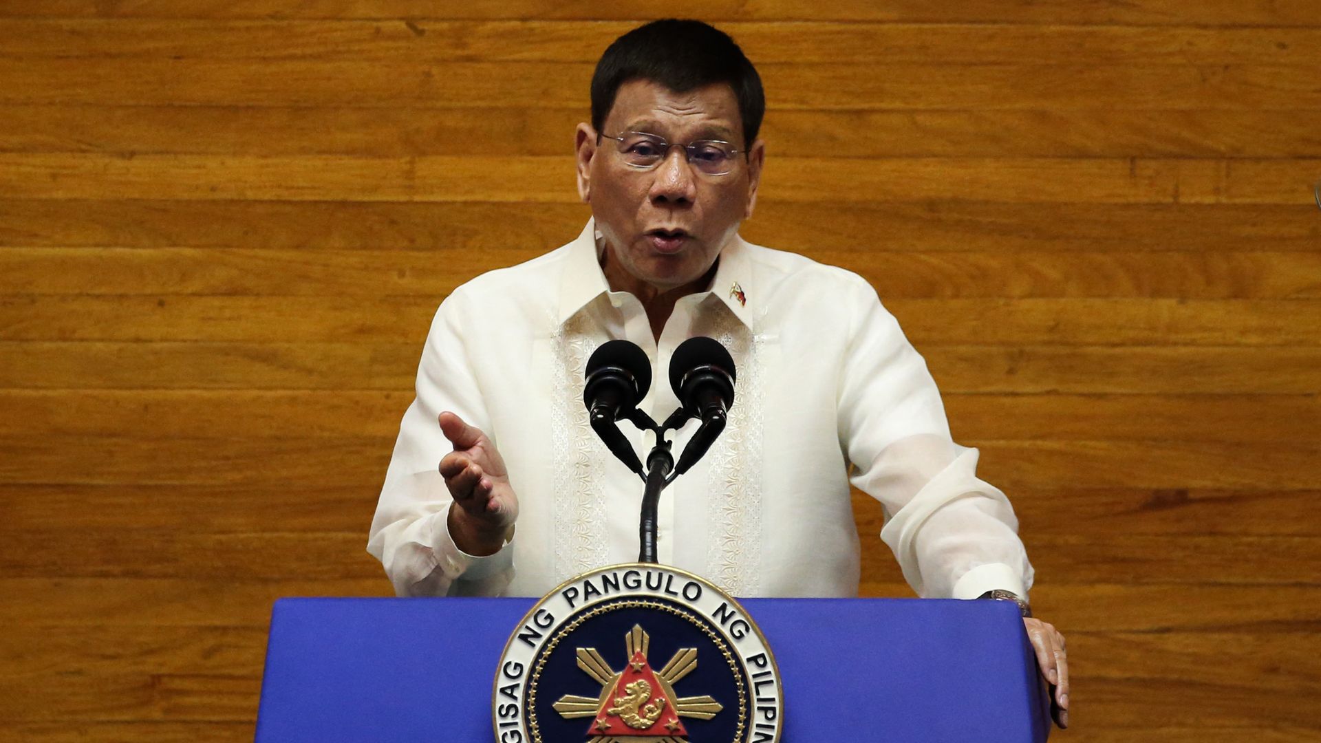 Philippine President Rodrigo Duterte speaks during the annual state of the nation address at the House of Representatives in Manila on July 26