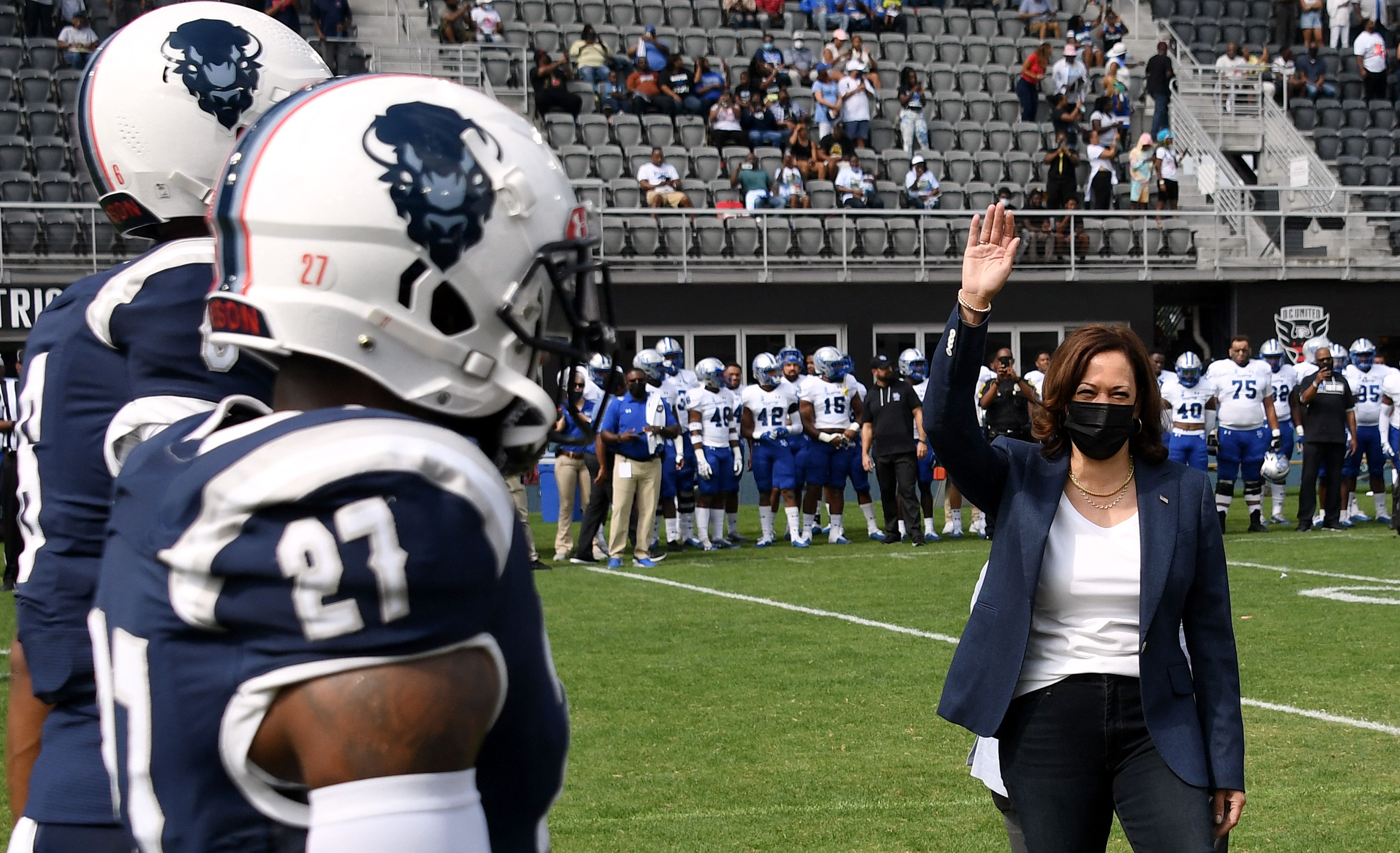 Vice President Kamala Harris participates in the coin toss at the opening of the football game between Howard University and Hampton University.