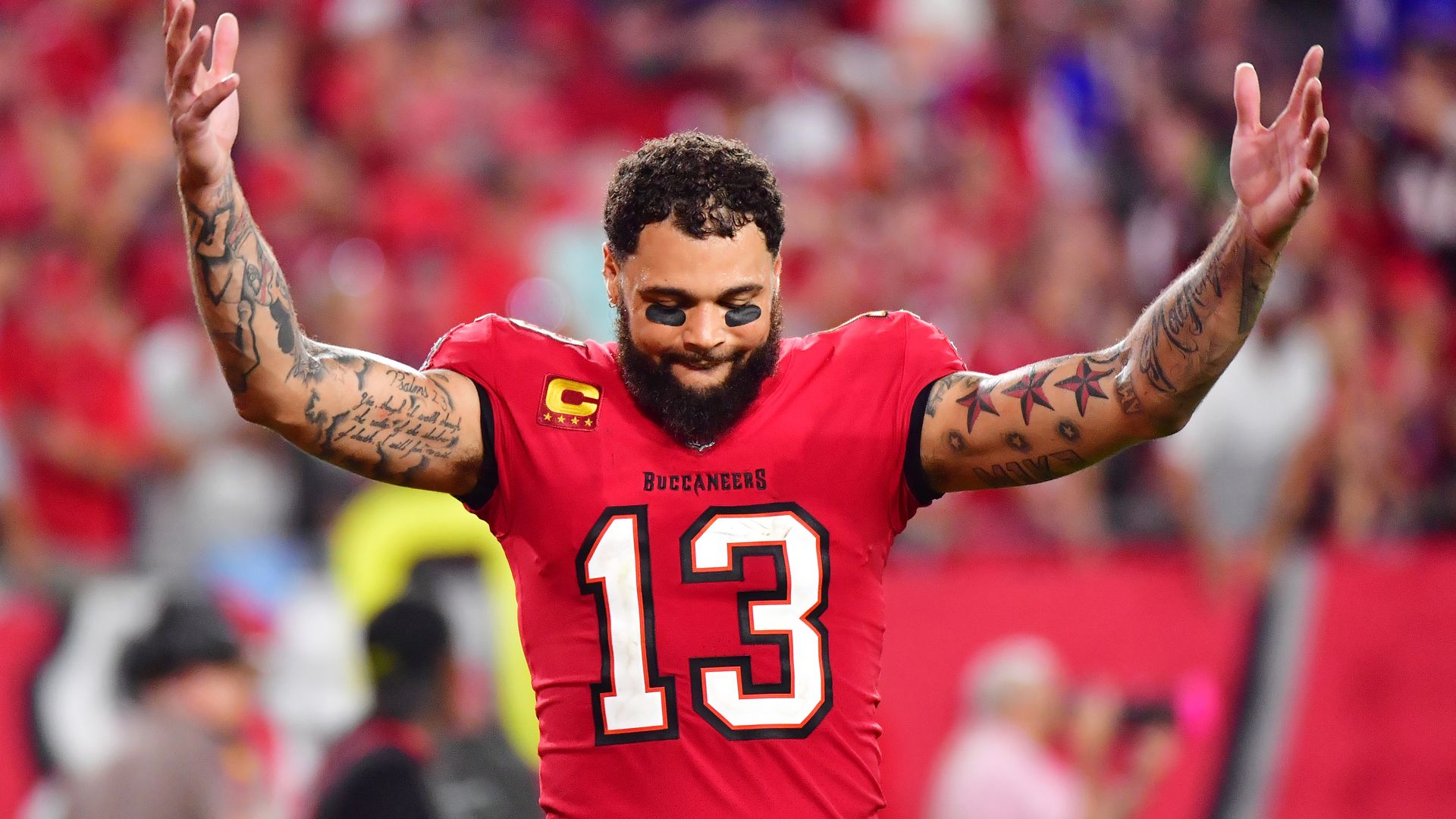 Mike Evans #13 celebrates after the Tampa Bay Buccaneers defeated the Buffalo Bills 33-27 in overtime at Raymond James Stadium on December 12, 2021 in Tampa, Florida. 