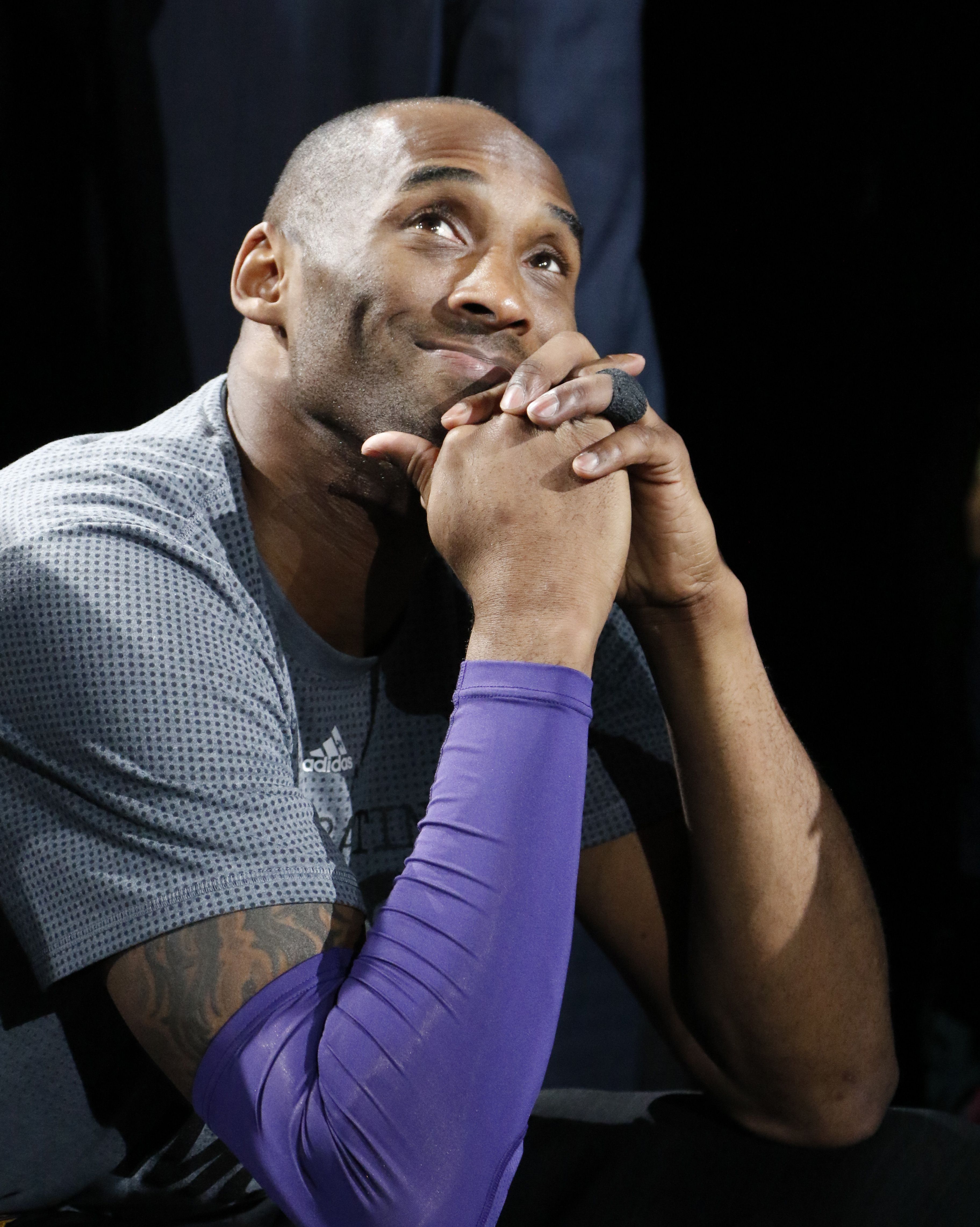 Kobe Bryant looking up at the ceiling