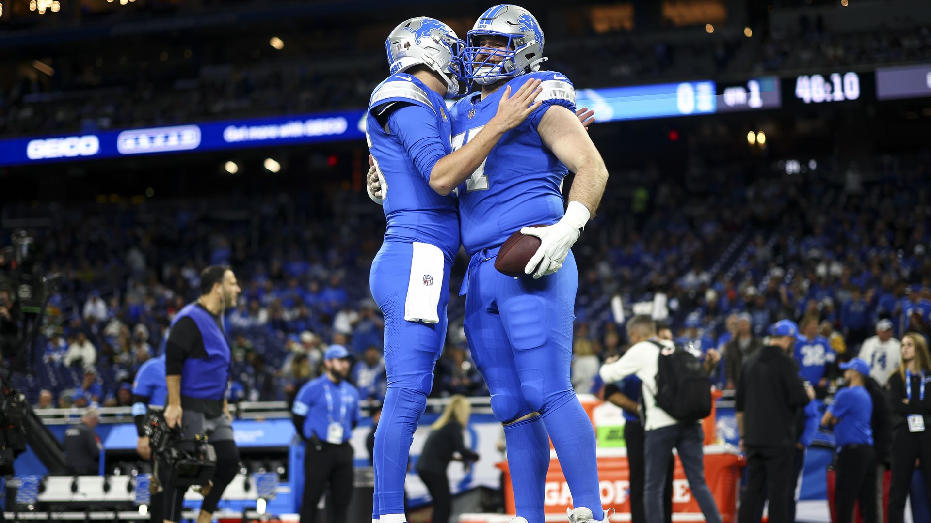 Two players embrace