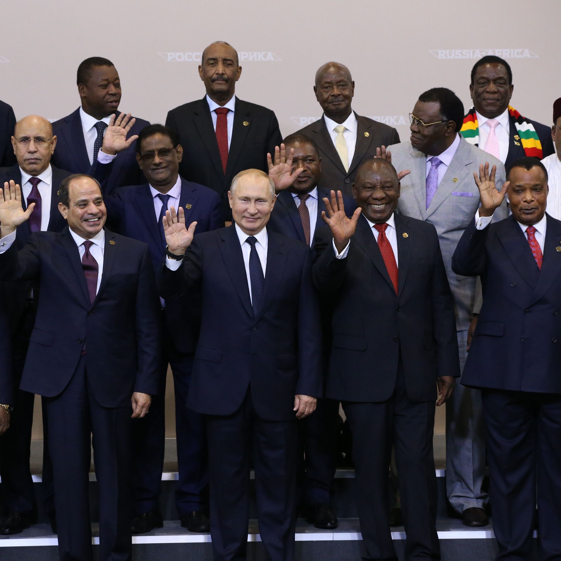 Putin and African leaders gathered and waving