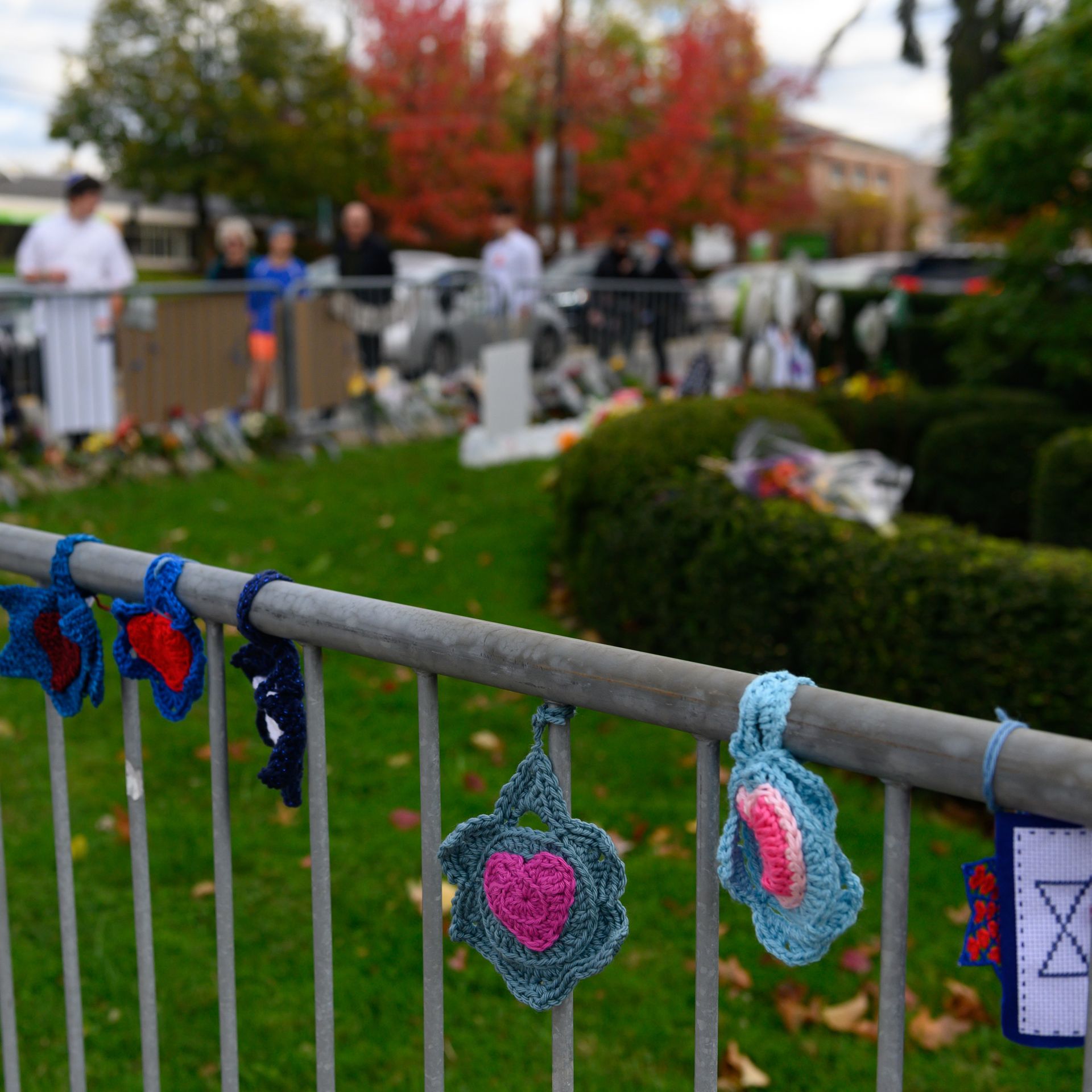 Woven Stars of David hang along the fence at the Tree of Life Synagogue in Pittsburgh on the 1st anniversary of a mass shooting at the synagogue.
