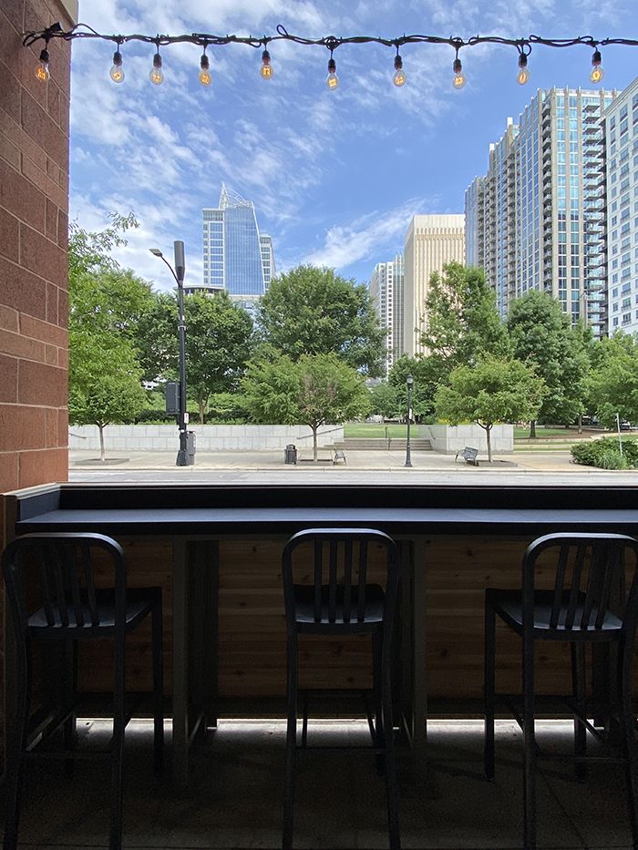 The view from the ground floor of the pub looking at Romare Bearden Park. Photo: Ashley Mahoney/Axios 