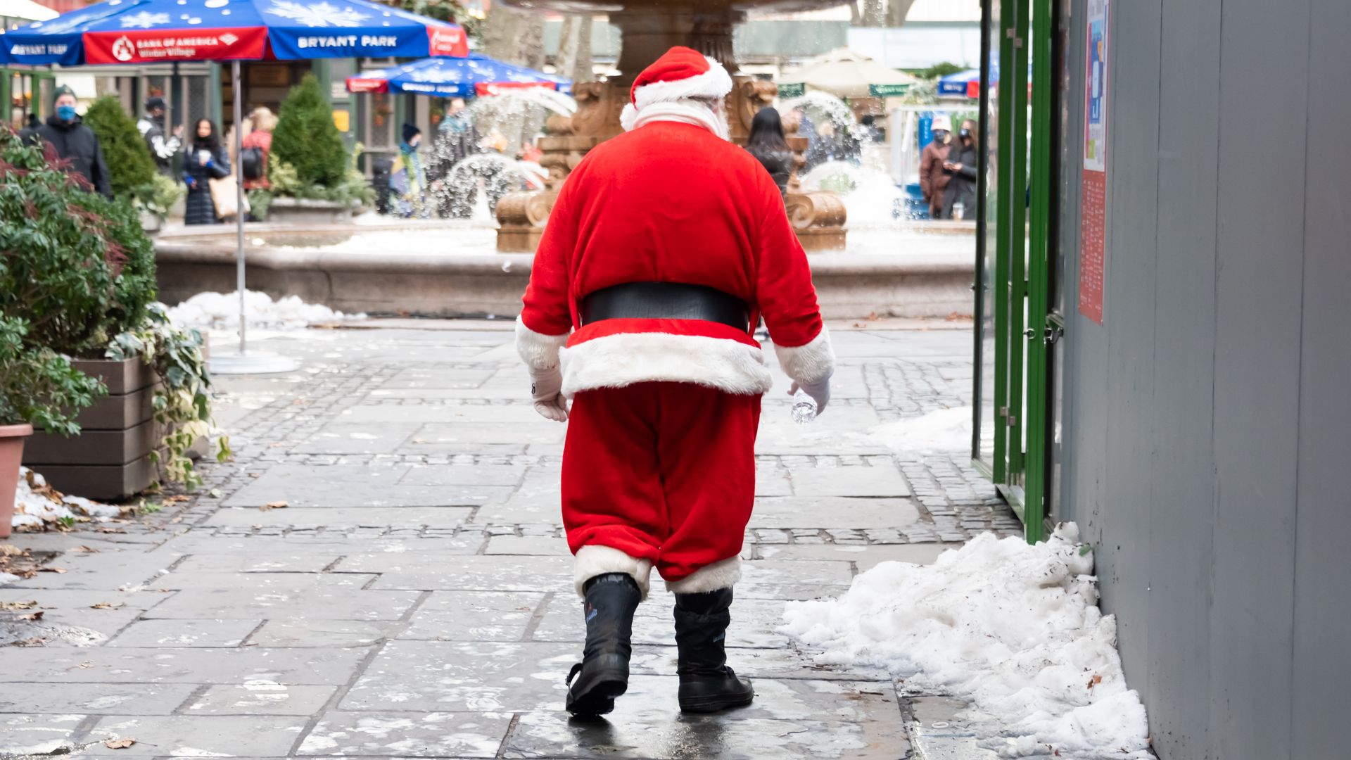 Santa walking around New York City on Dec. 23.