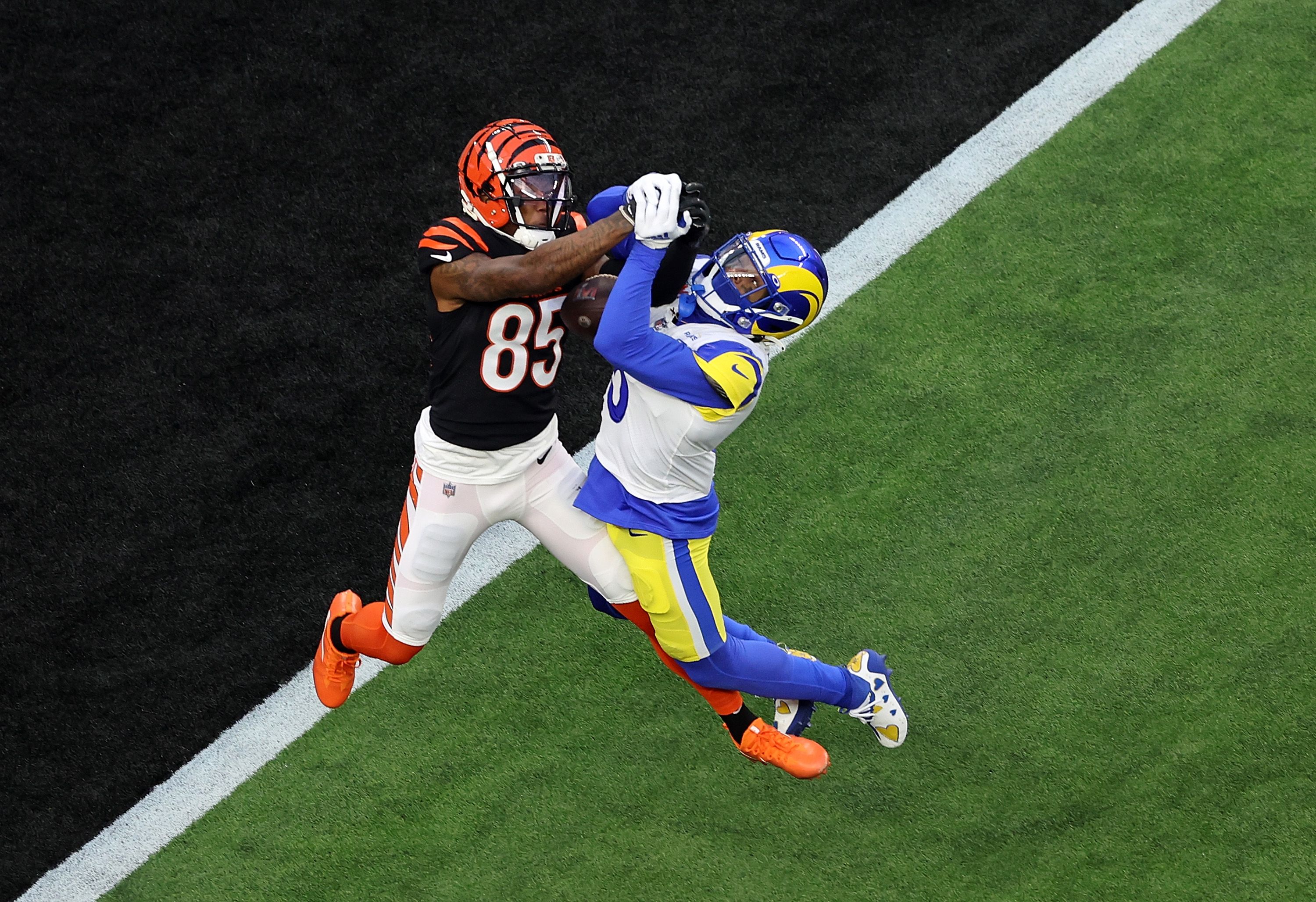 Tee Higgins #85 of the Cincinnati Bengals has a pass broken up by Jalen Ramsey #5 of the Los Angeles Rams during Super Bowl LVI at SoFi Stadium on February 13, 2022 in Inglewood, California