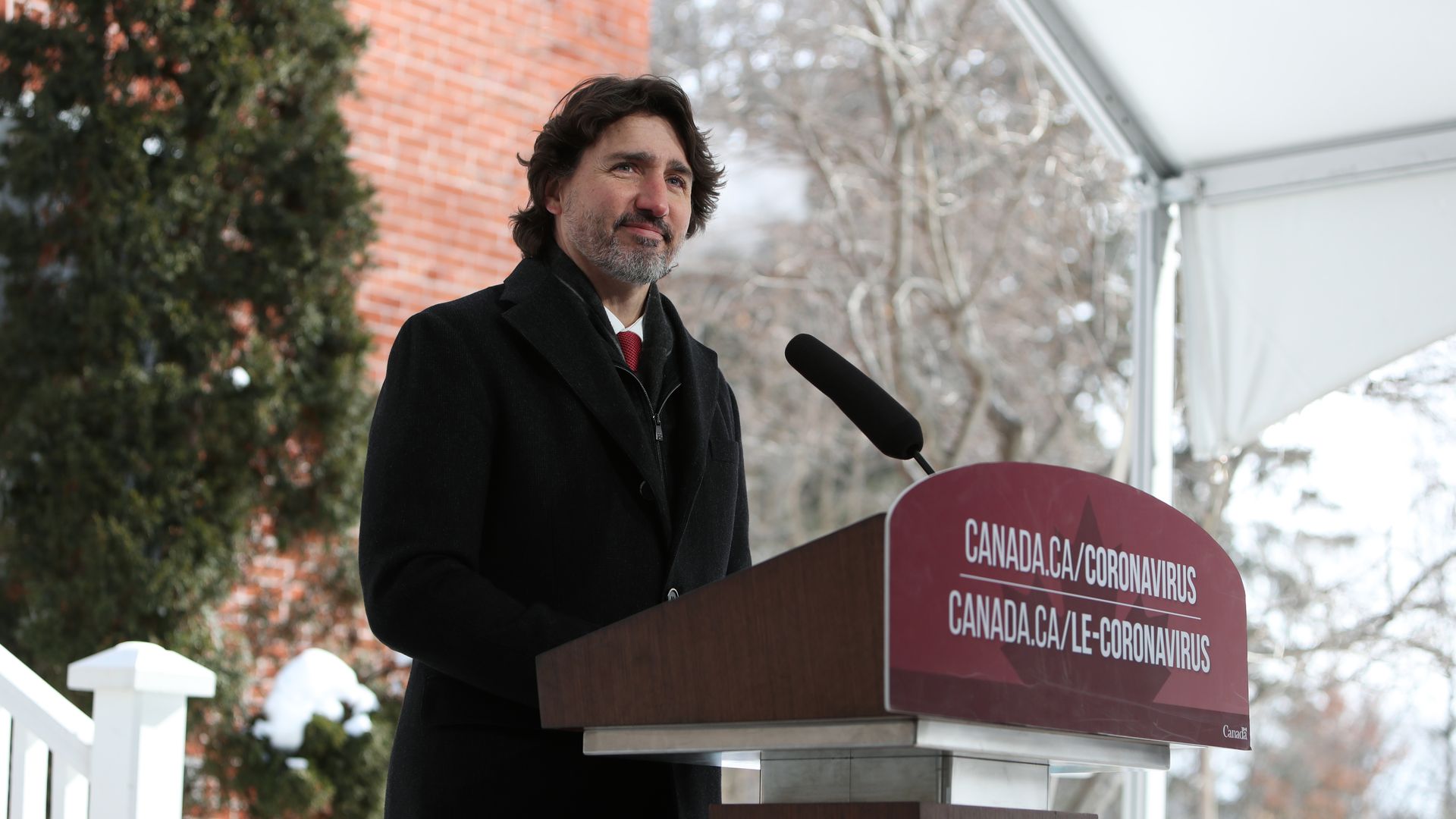Justin Trudeau, Canada's prime minister, listens during a news conference in Ottawa, Ontario, Canada, on Friday, Feb. 12