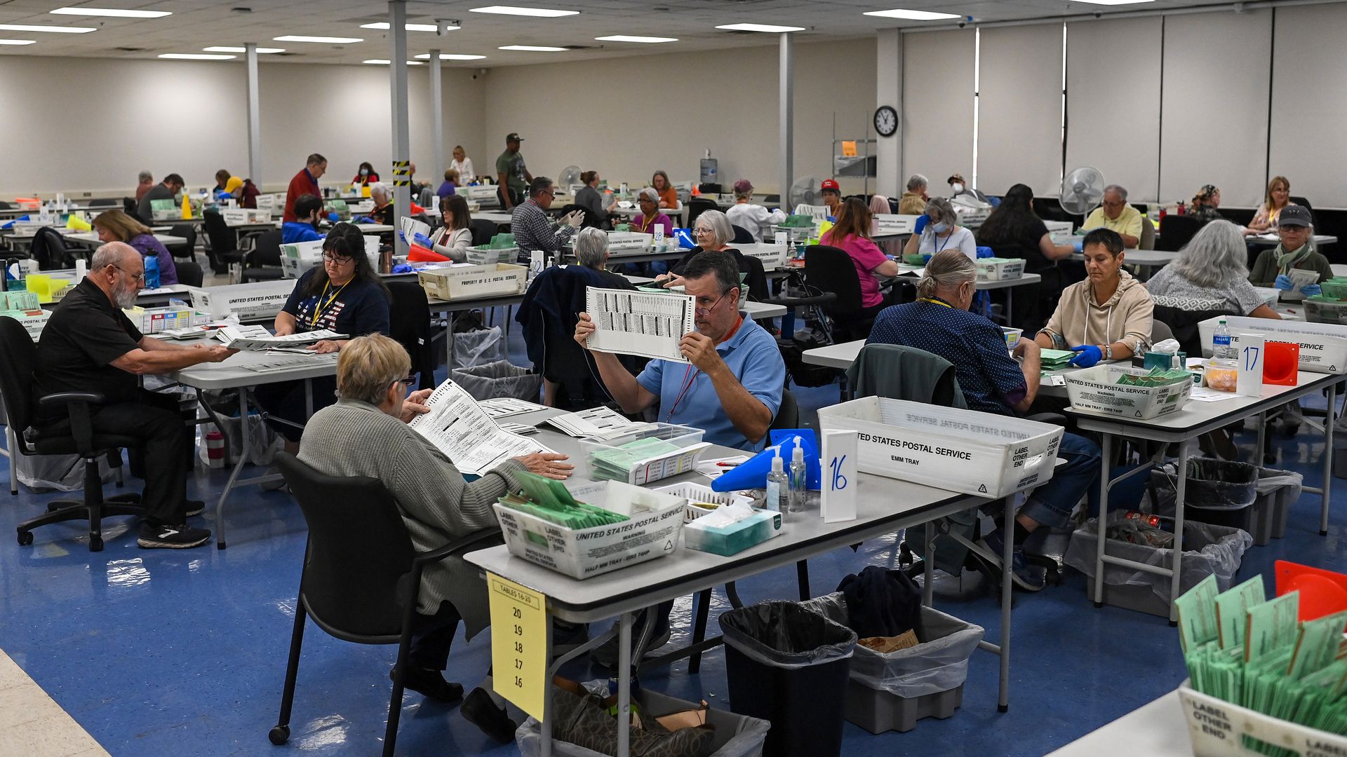 Election workers process ballots at the Maricopa County Tabulation and Election Center on November 10, 2022 in Phoenix, Arizona. 