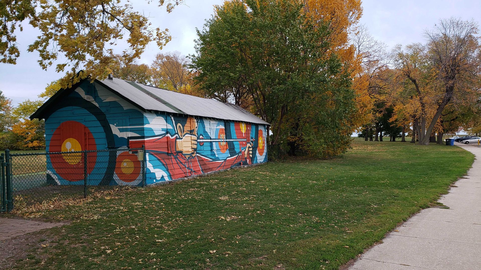 Photo of a colorfully painted barn.