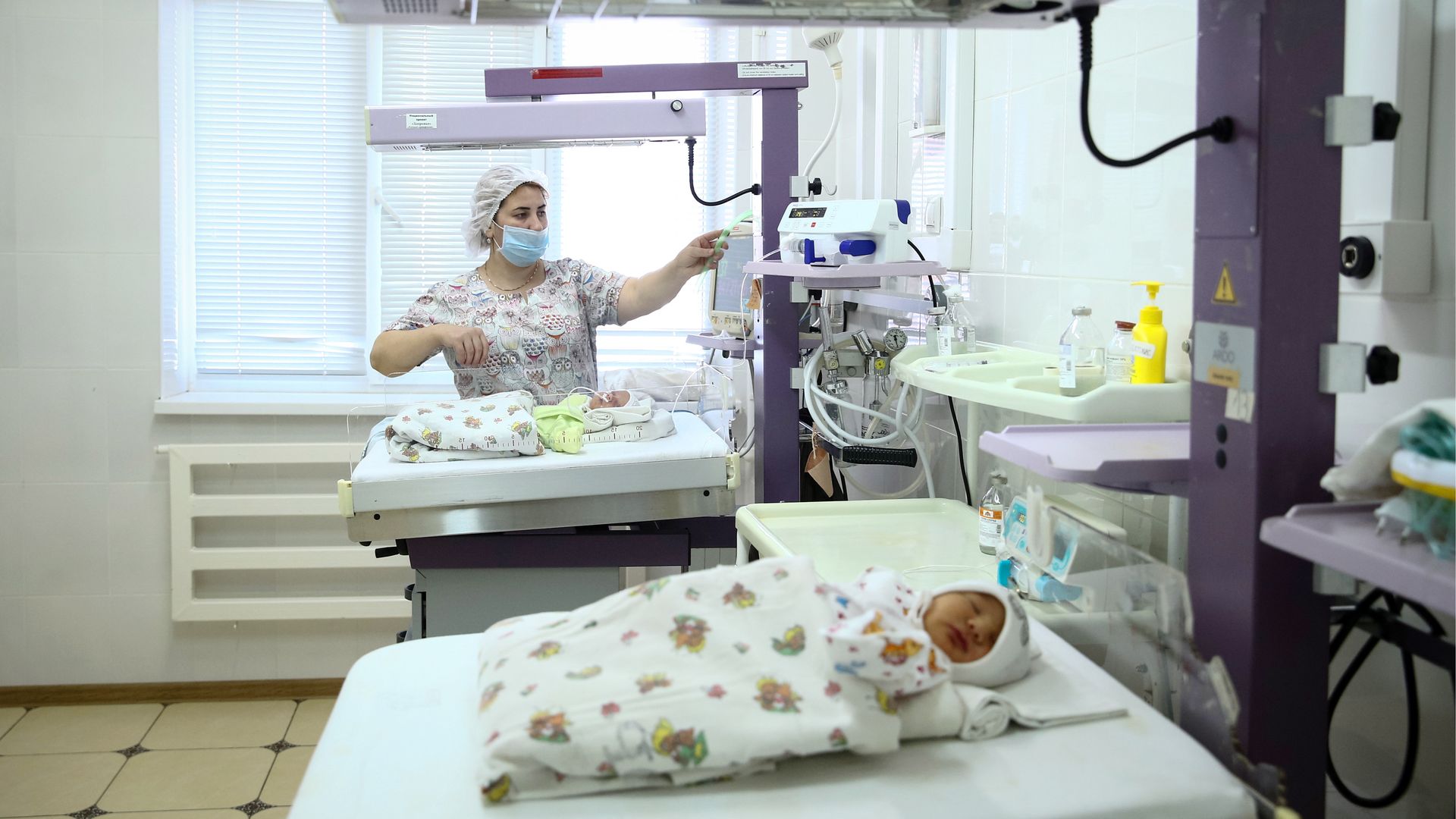 Baby and doctor.