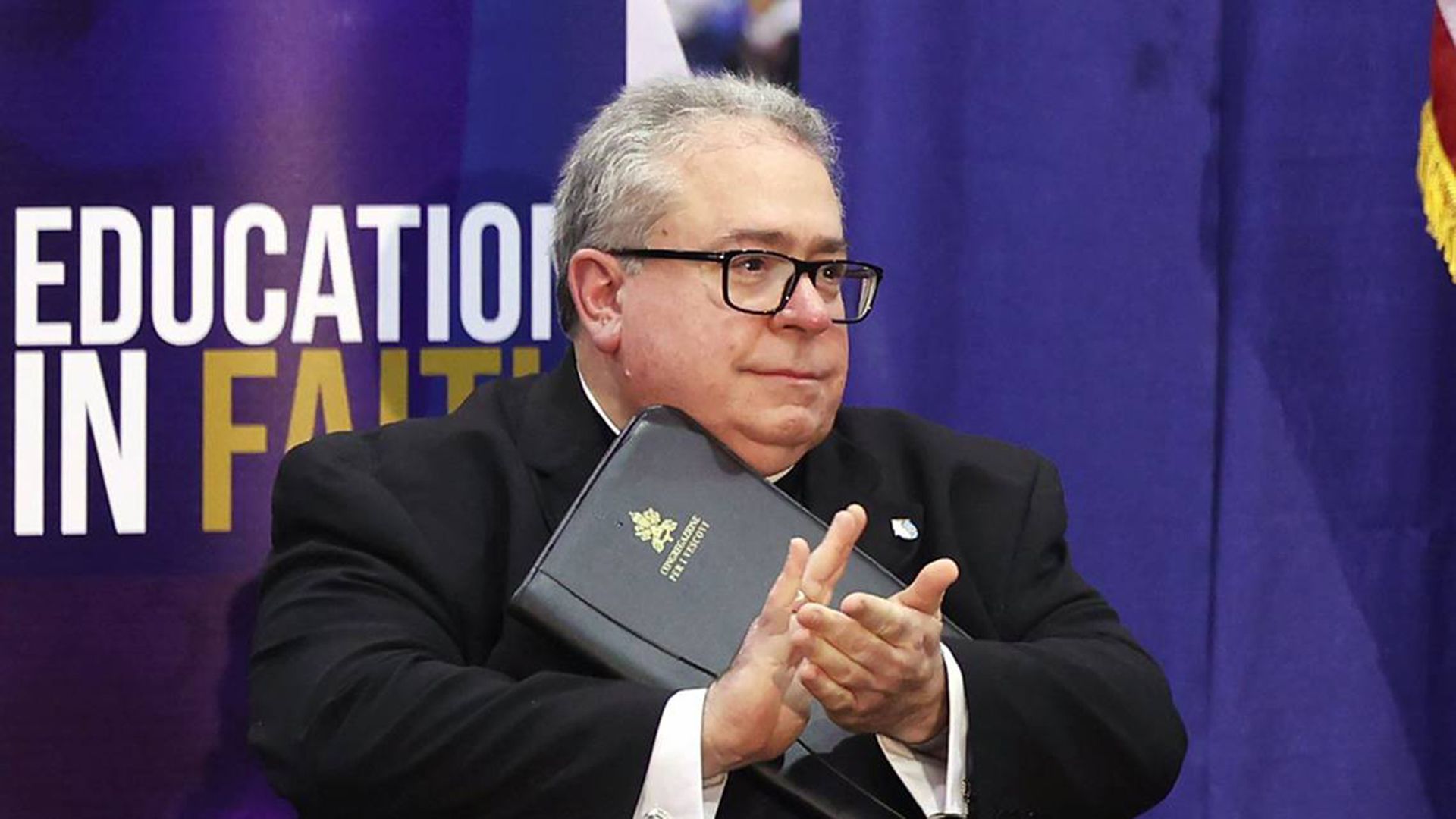A man holding a bible 