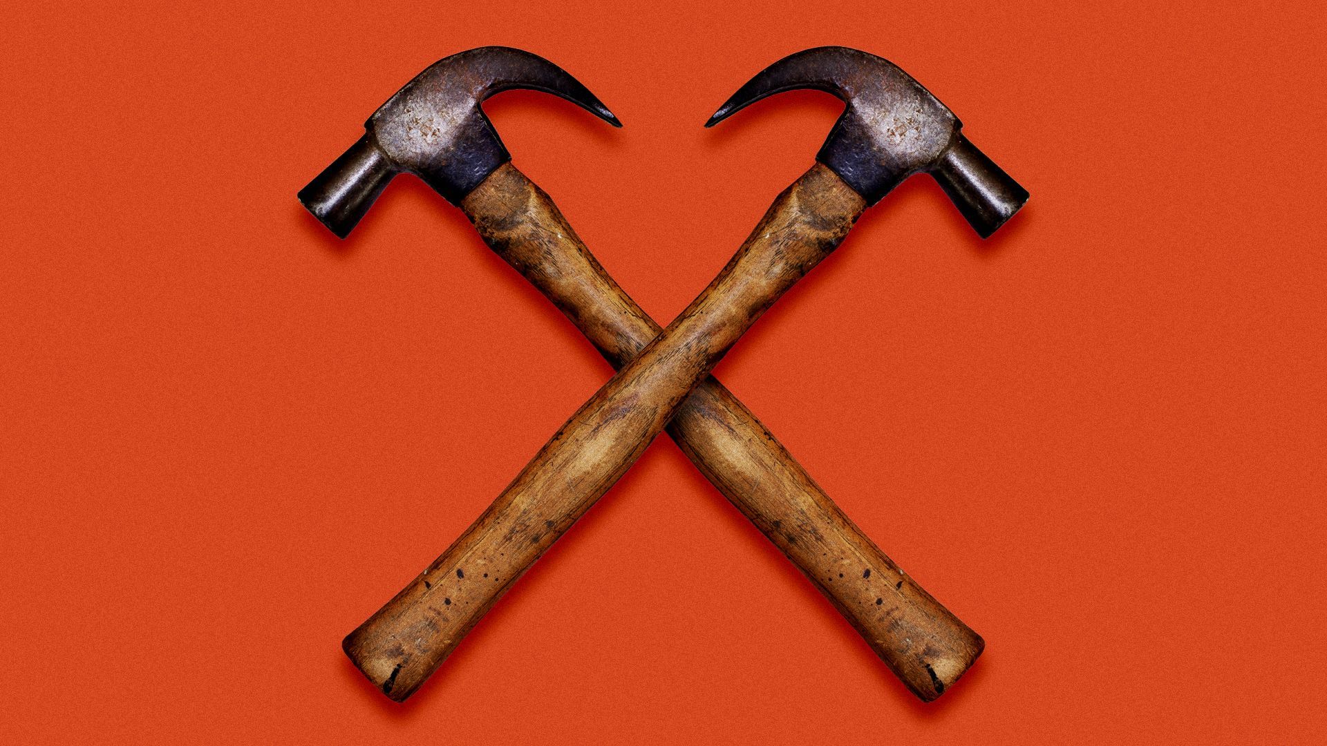 Illustration of two hammers forming an "X" shape.