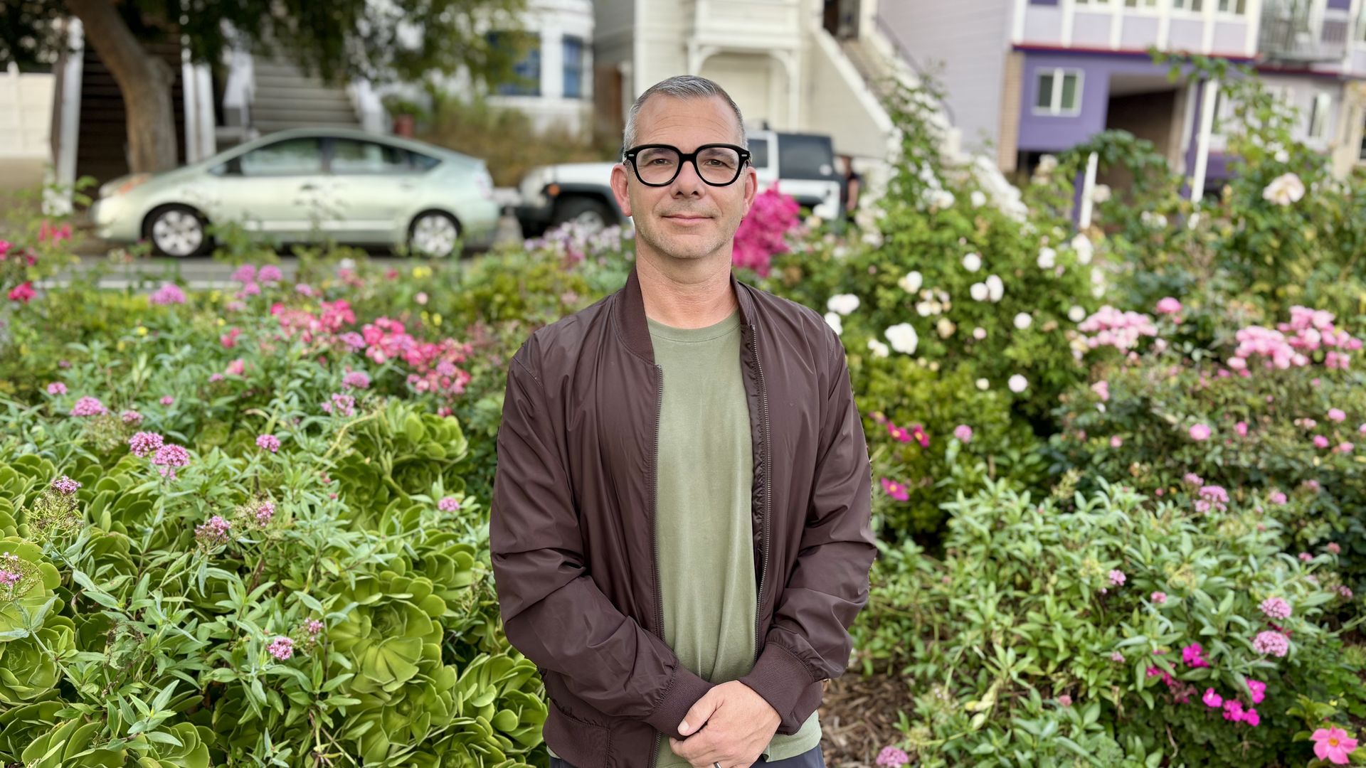 District 8 contender Gary McCoy stands in front of Pink Triangle Memorial Park — where, decades ago, he once slept while experiencing homelessness.