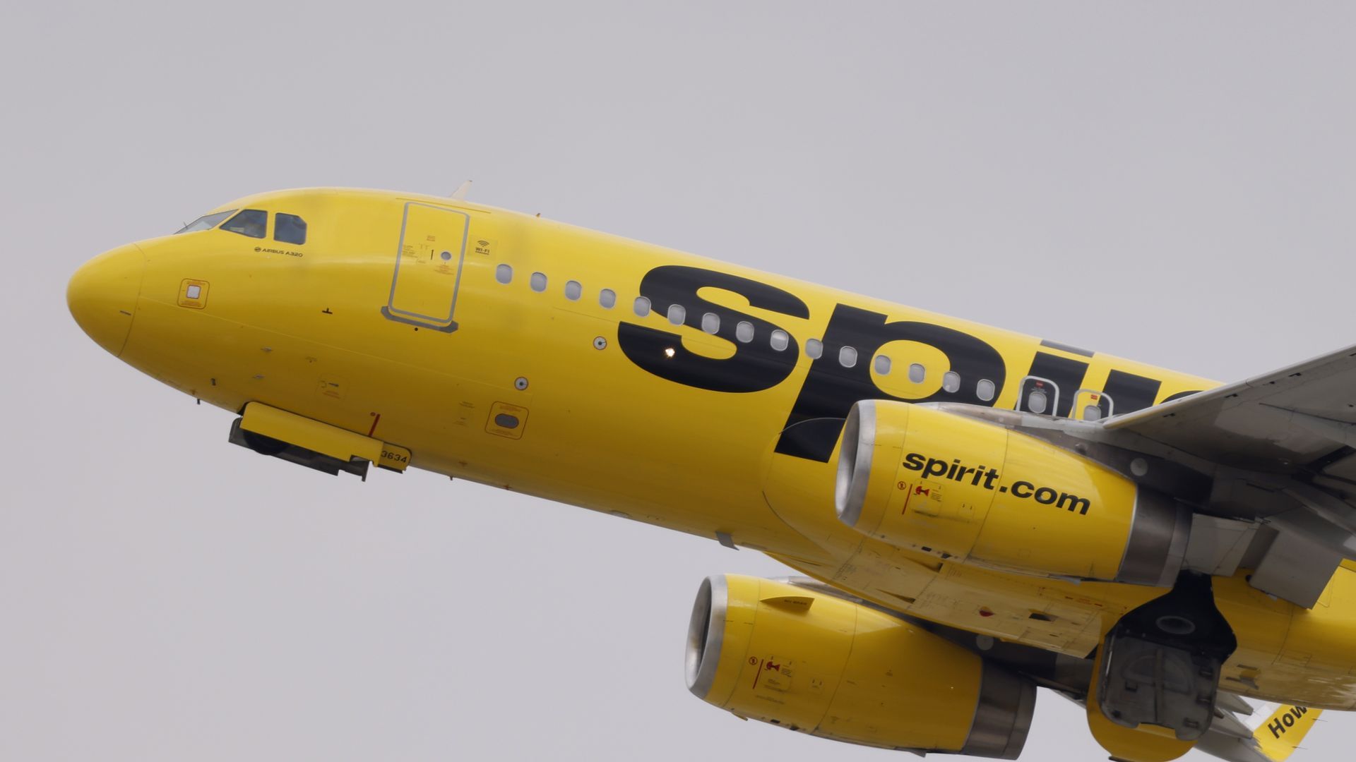 A yellow plane that says "Spirit" in black lettering on it
