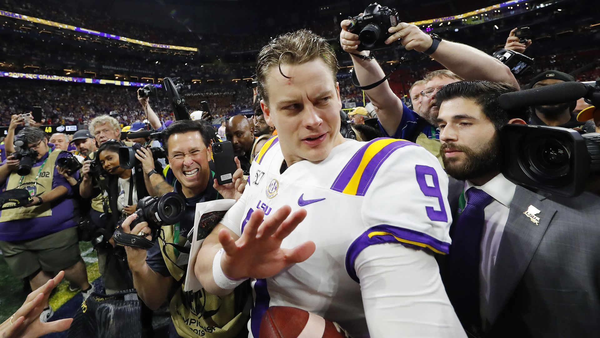LSU quarterback Joe Burrow amid a media throwing following the team's win in the SEC championship game.
