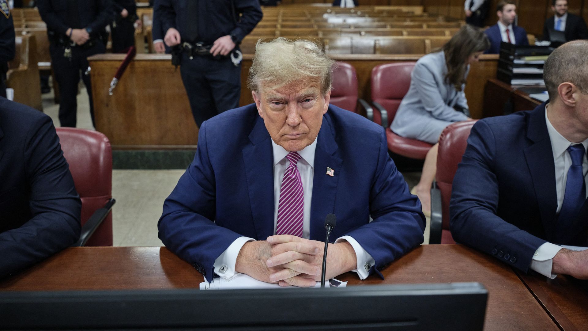 Former US President Donald Trump attends his trial for allegedly covering up hush money payments linked to extramarital affairs, at Manhattan Criminal Court in New York City on April 19, 2024.